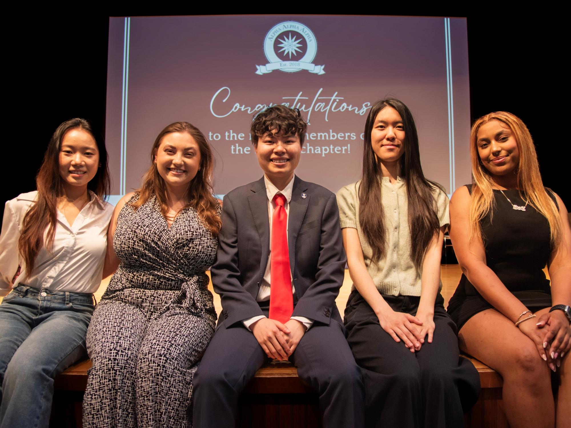 Five new Tri-Alpha board members pose for group photo