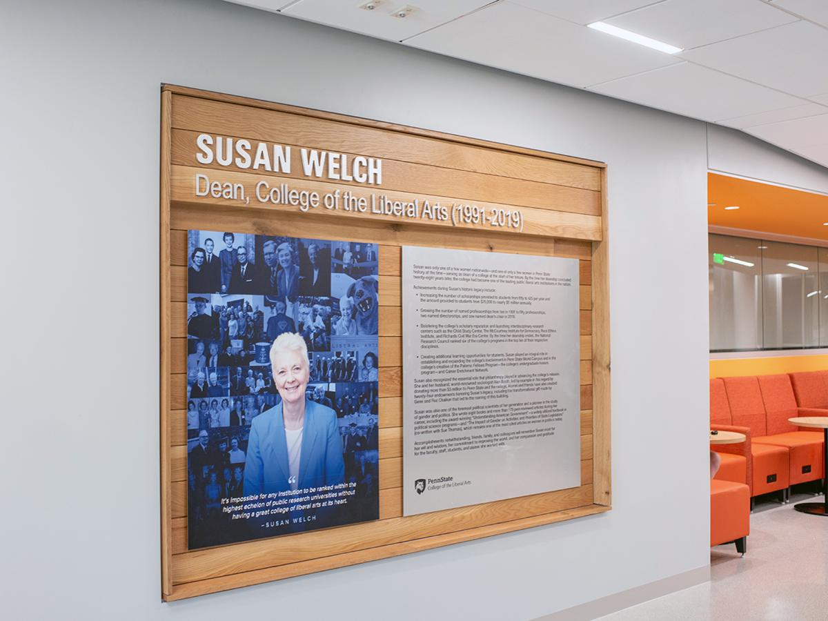 Photo collage and biosketch of Susan Welch found at entrance to Welch Building