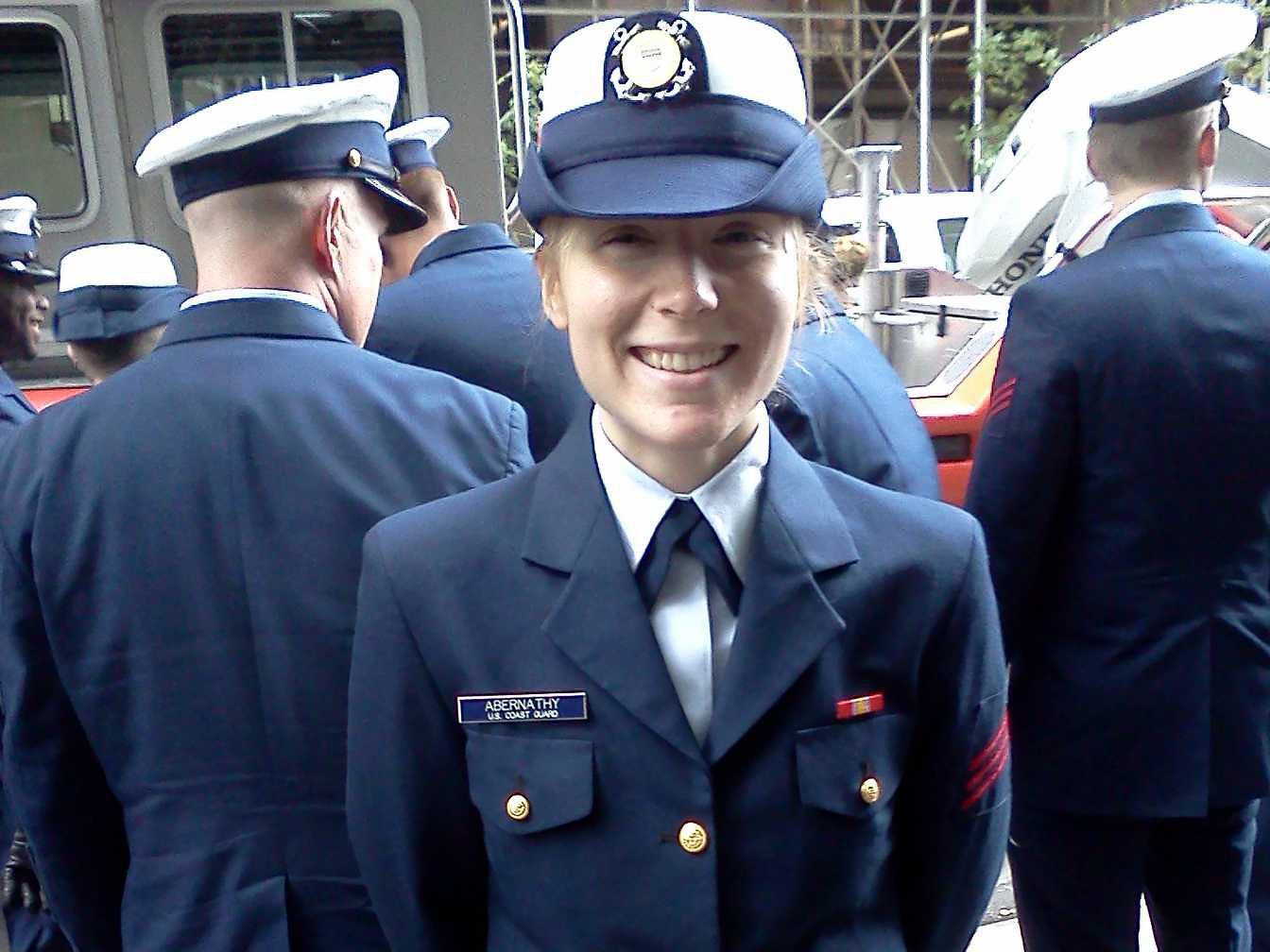 Jessie Wolfen wears her Coast Guard uniform while standing outside in New York City. 