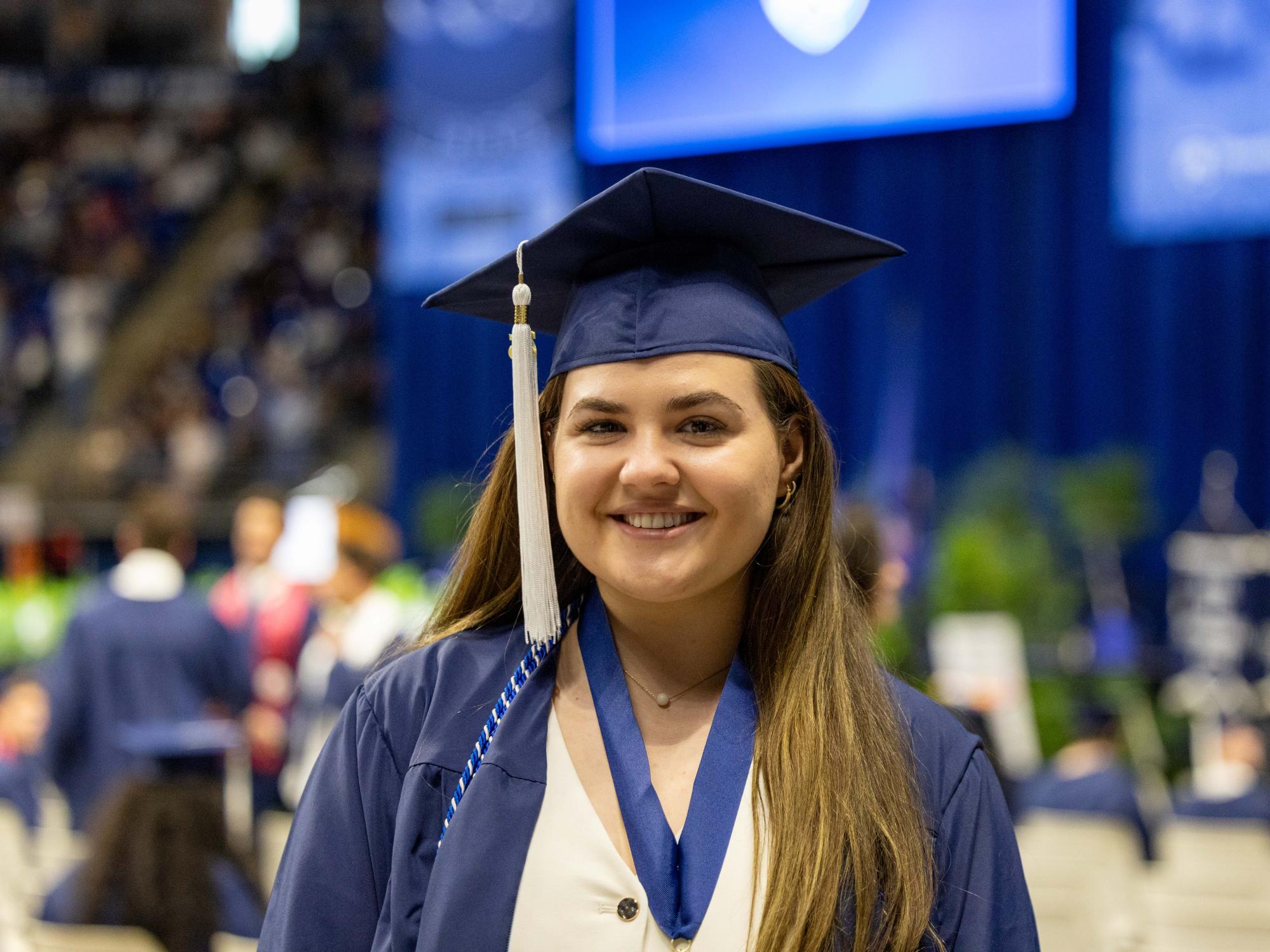 Maggie Day wears her cap and gown at spring commencement.
