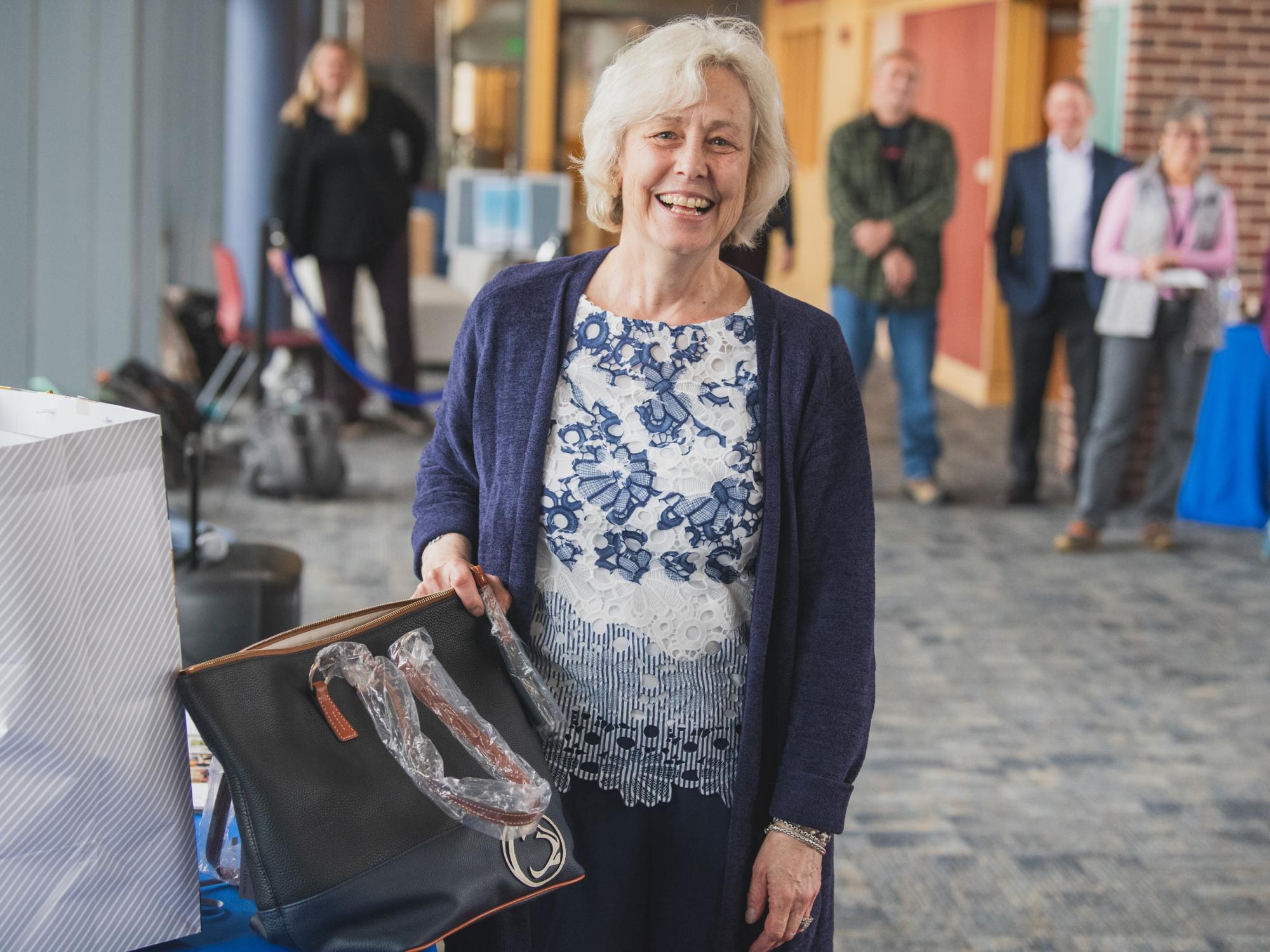 Jackie Bortiatynski with a Penn State bag.