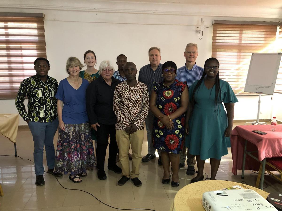 Janelle Larson poses with Ghanians