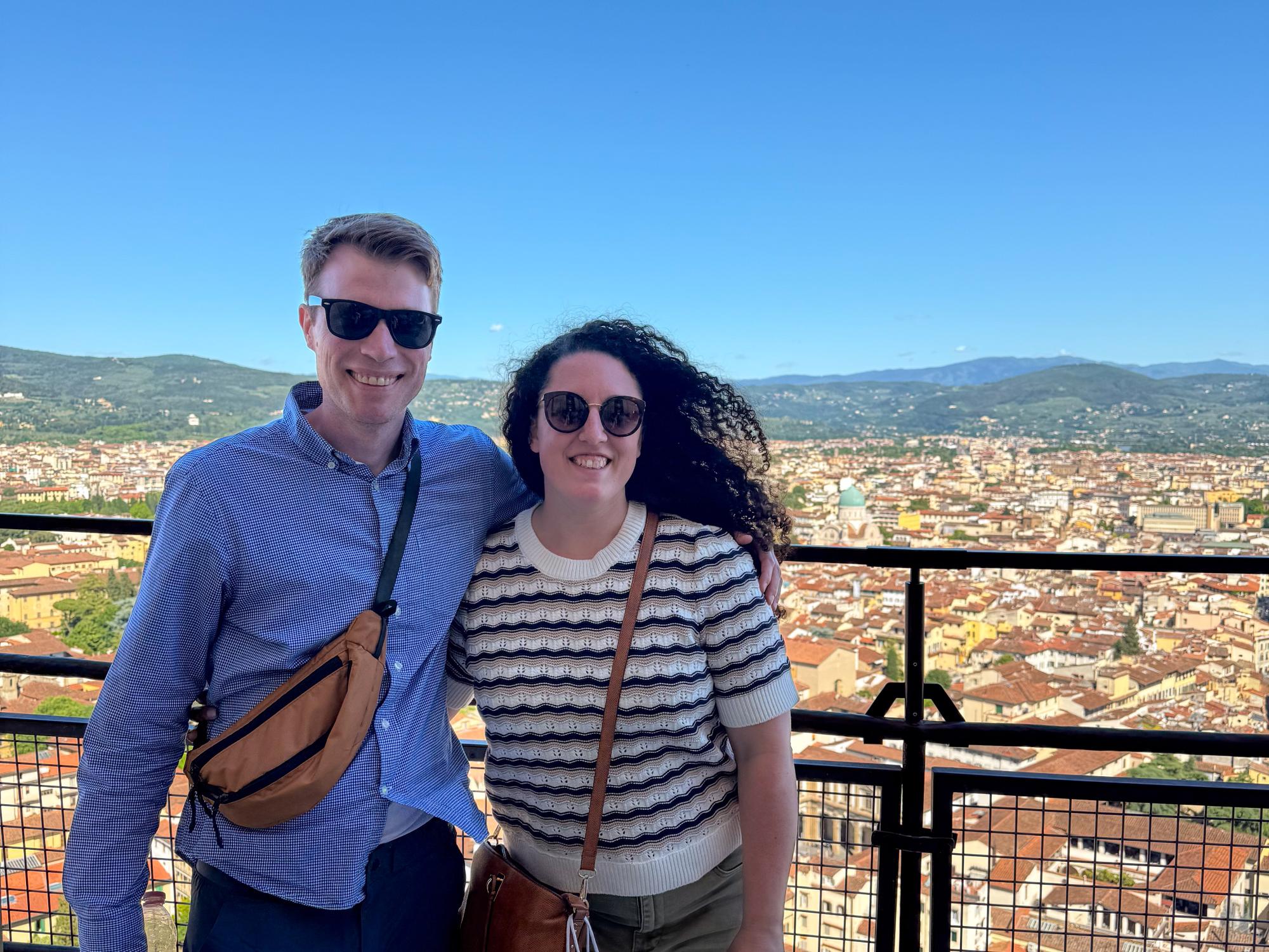The program’s faculty leaders, Joseph Bauman and Lauren Halberstadt, stand on top of the Duomo in Italy.
