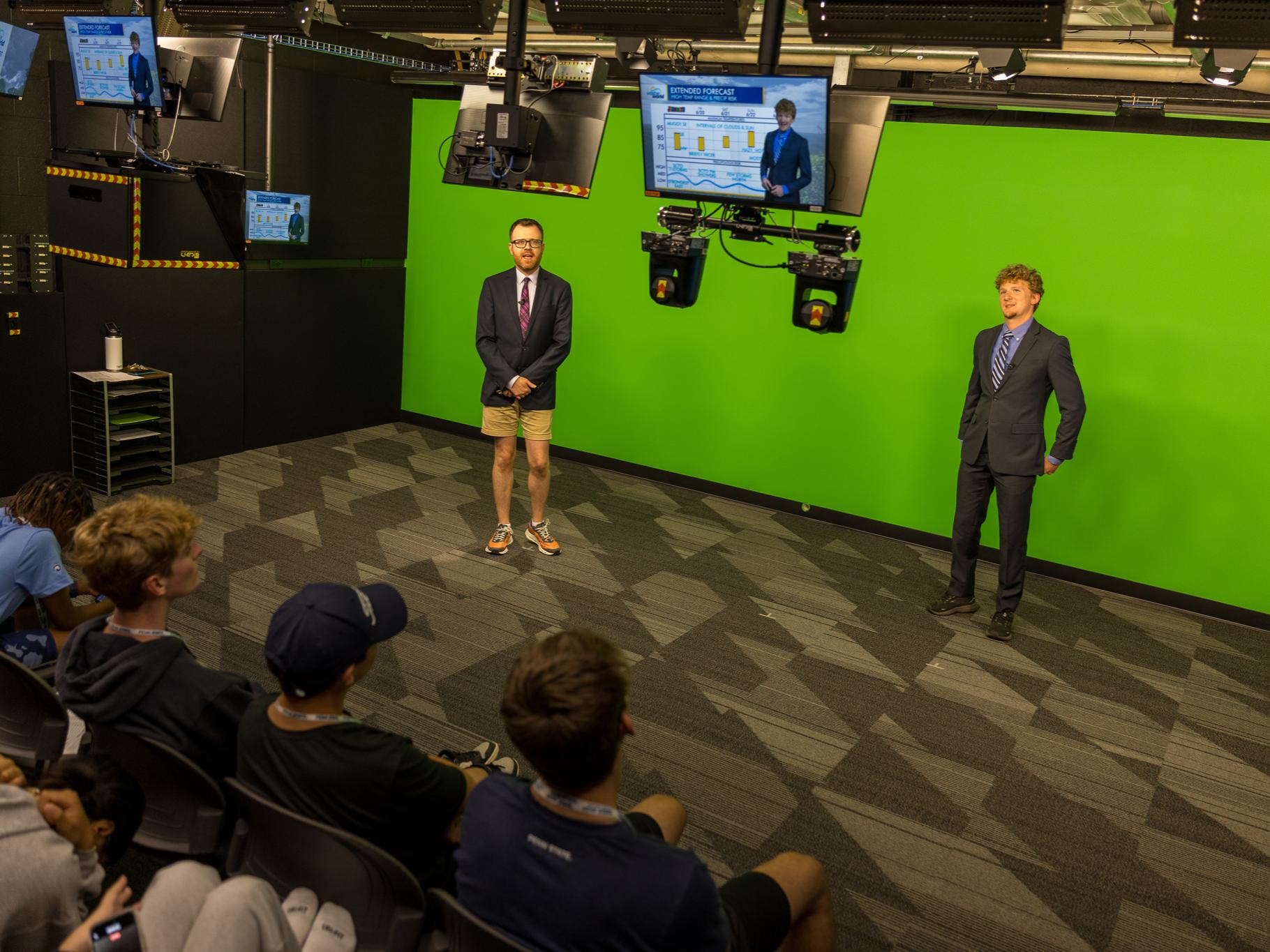 Rob Lydick and Karl Schneider host an episode of Weather World