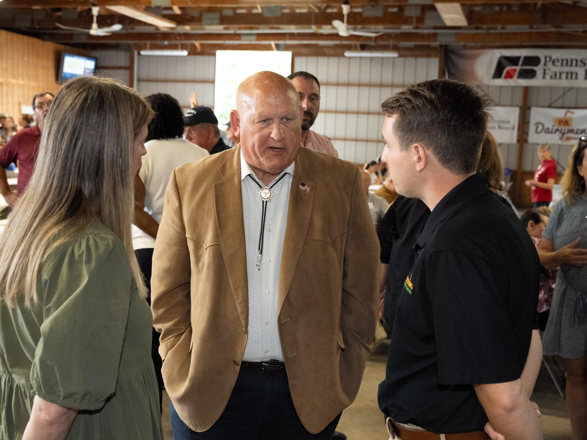 U.S. Rep. Glenn "GT" Thompson talks with exhibitors at Ag Progress Days.