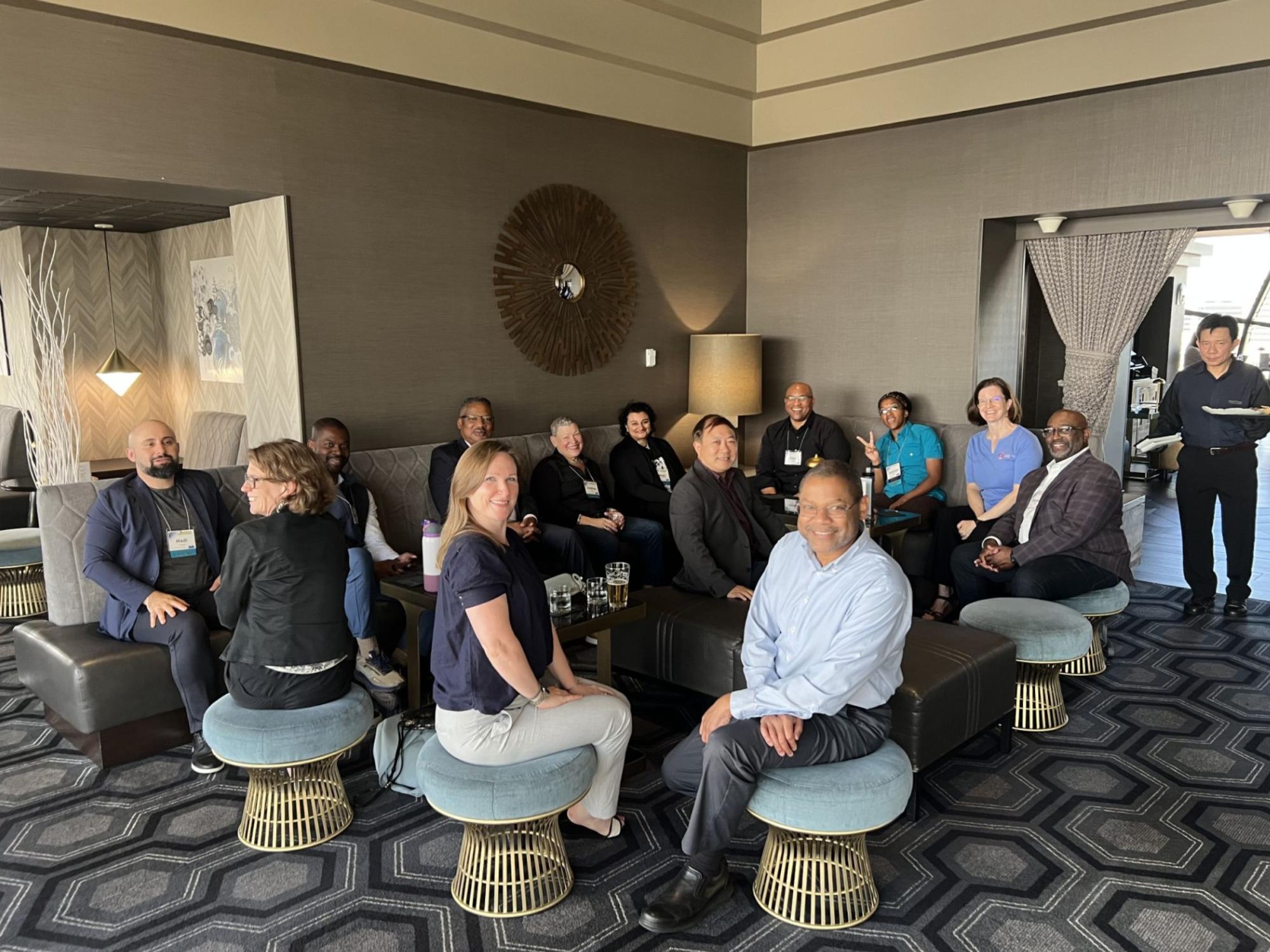 group of people networking in a conference room