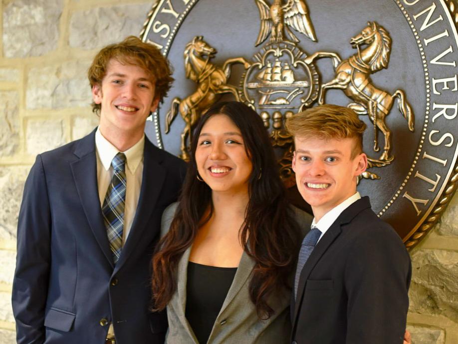 Ben Lindgren with student leaders Mike Fowler and Litzy Sandoval at the HUB-Robeson Center.
