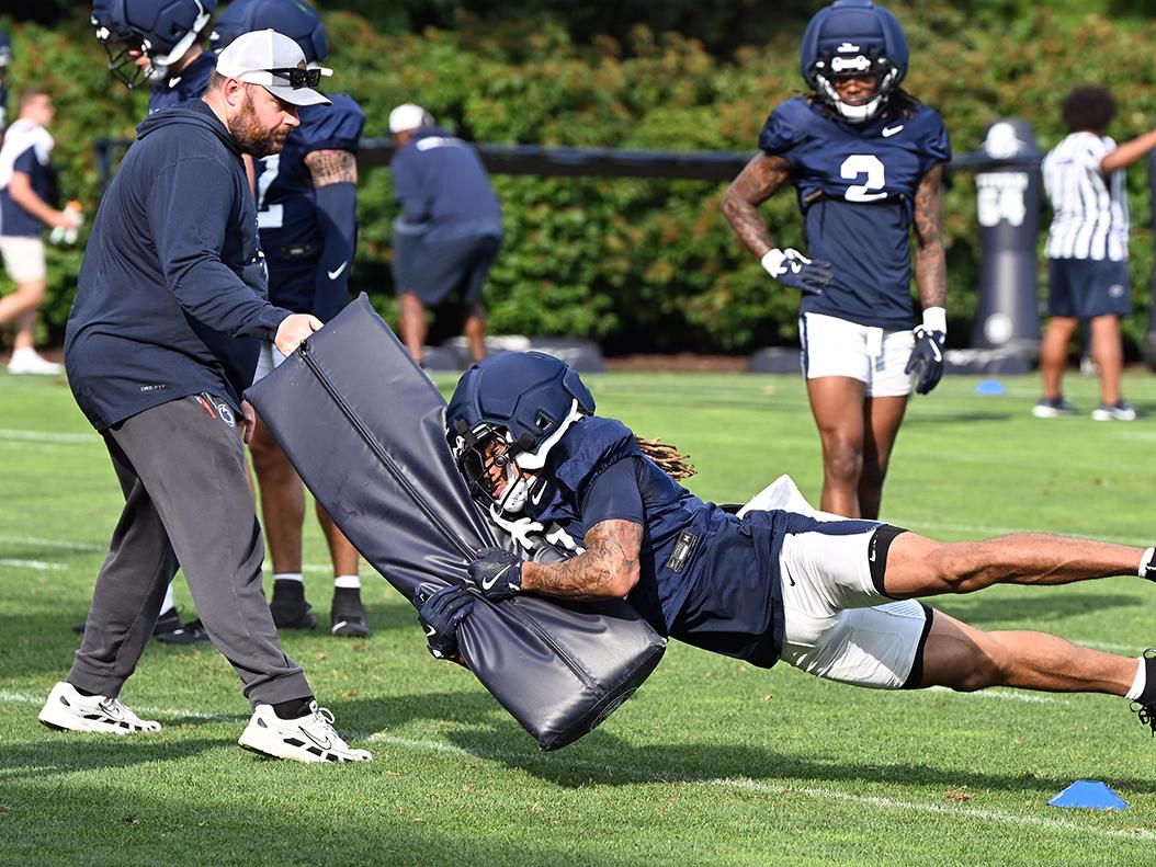 Player practices tackling