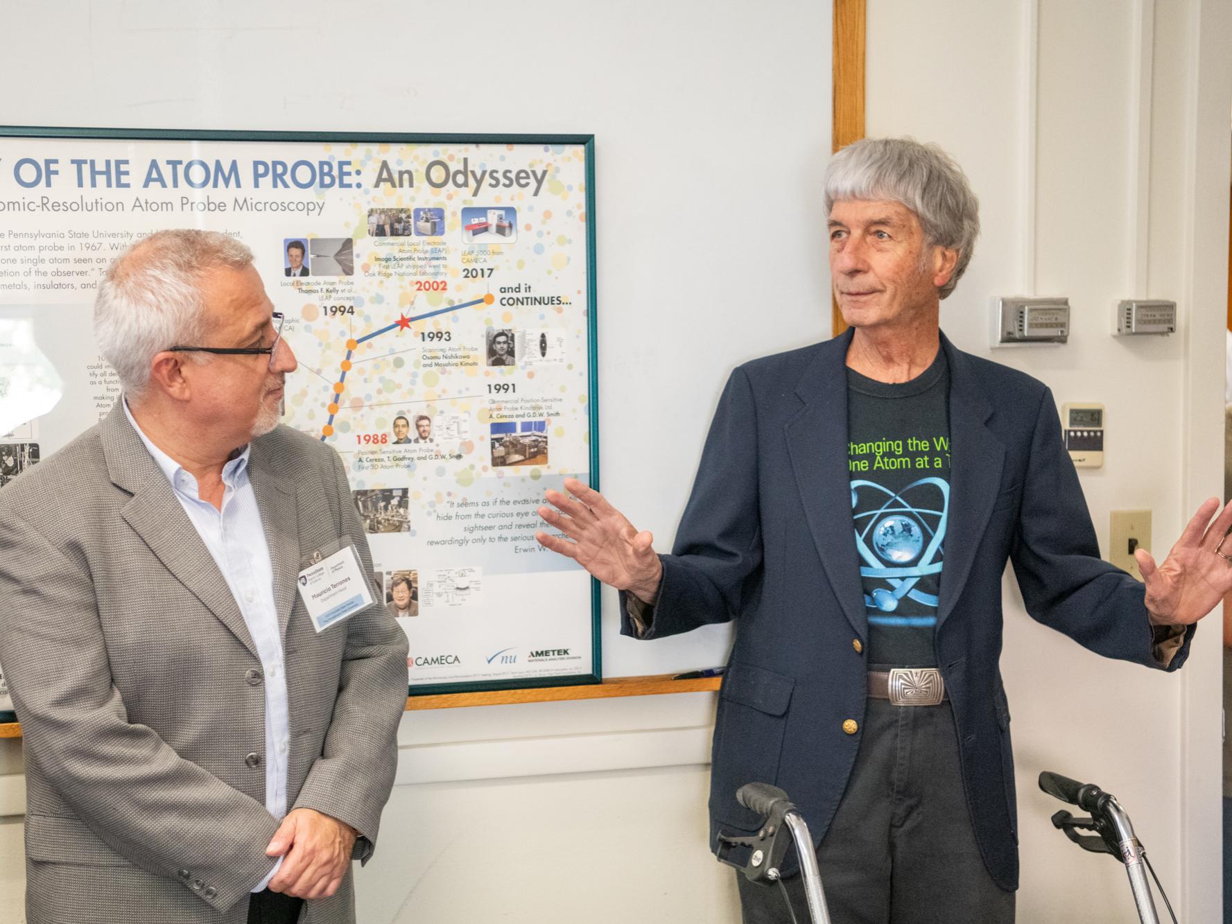 John Panitz (at right) spoke during the inaugural tour of an exhibition of Erwin Müller's historic equipment, at the college's “Celebrating Penn State’s Milestones in Physics” event on Sept. 5.