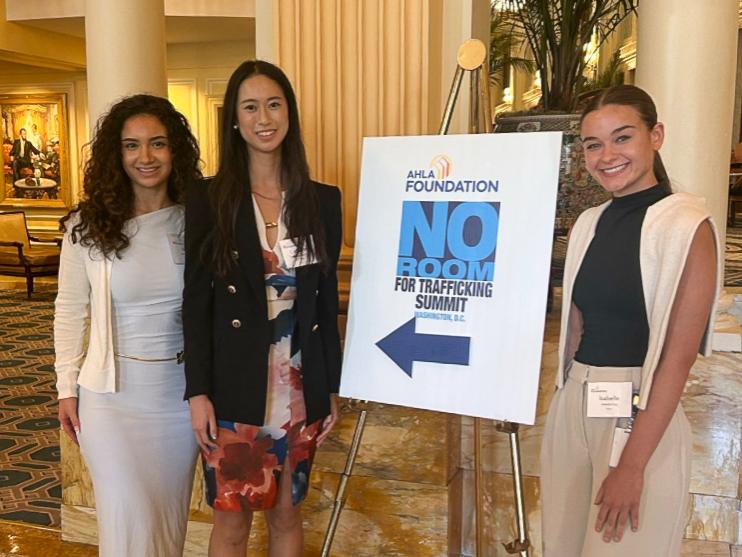 Isabelle Ems stands with two other people while attending the AHLA Foundation’s No Room for Trafficking Summit. 