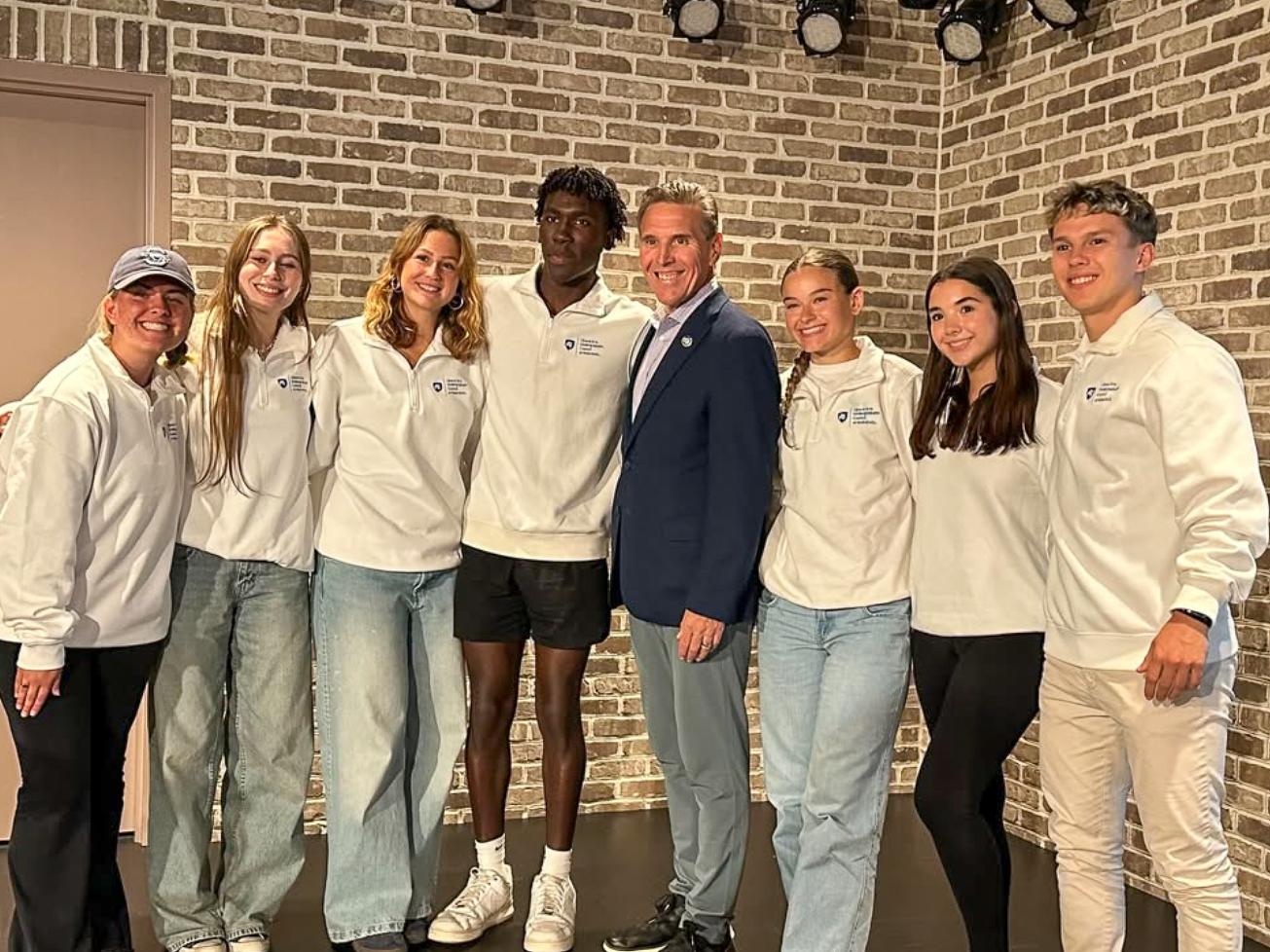 Ems gathers with Pennsylvania State Rep. Paul Takac and other members of the LAUC executive board at the Talk with Takac event.