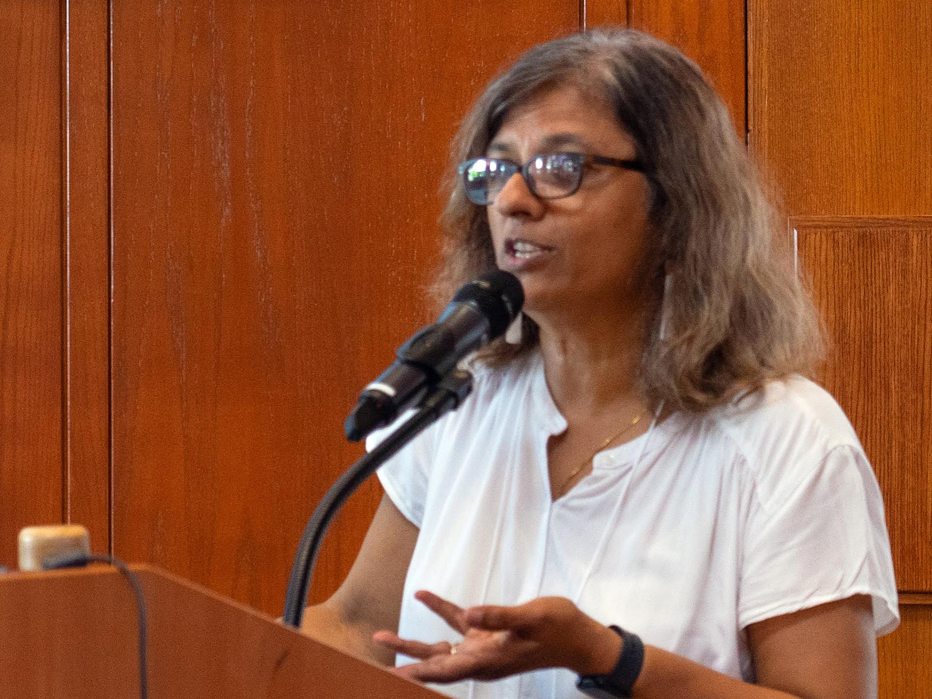 Woman speaking at podium