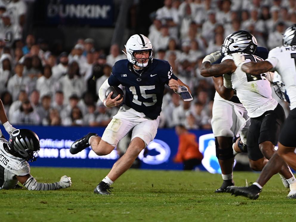 Quarterback rushes the ball