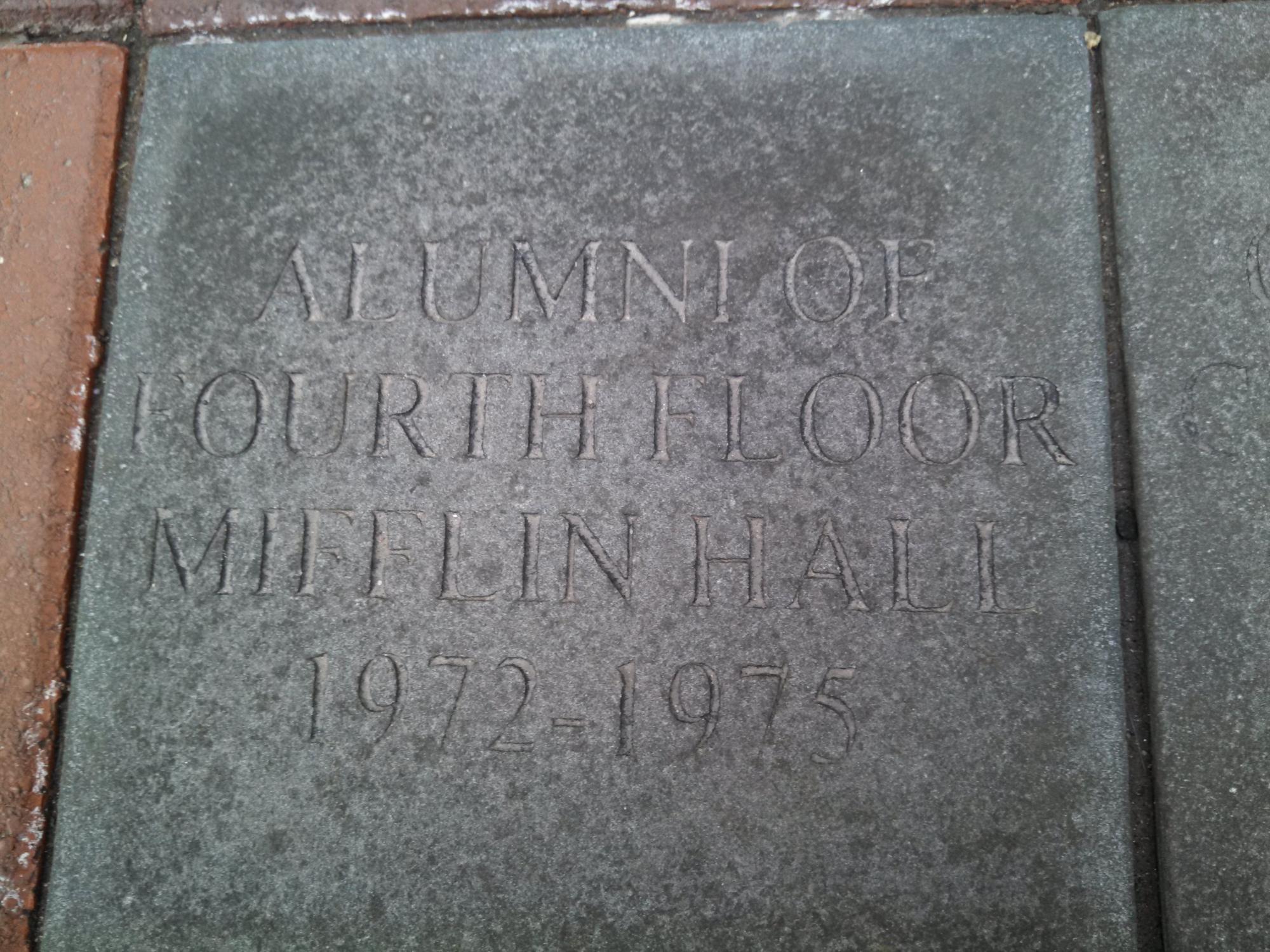 brick in alumni courtyard with the words Alumni of Fourth Floor Mifflin Hall 1972-1975