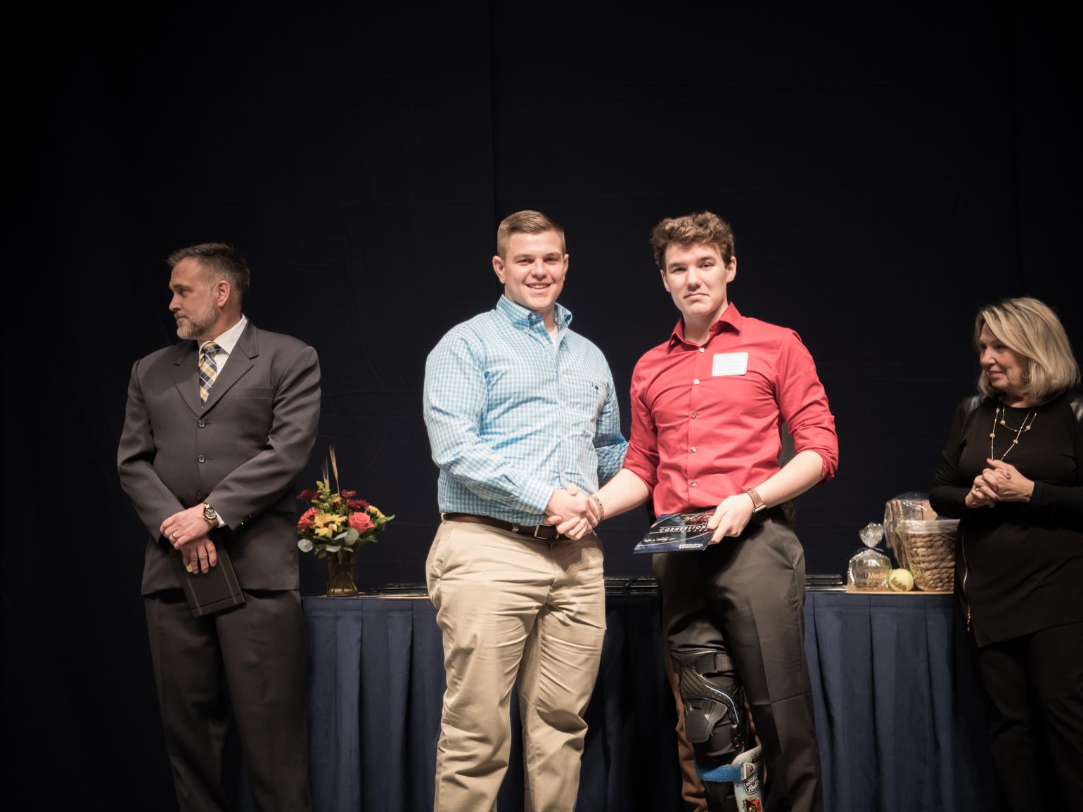 Rohrbaugh was honored at the WVU Medicine Jon Michael Moore Trauma Center Night of Recognition, receiving an award as a pediatric ICU nurse presented by patient honoree Colton Lowery.