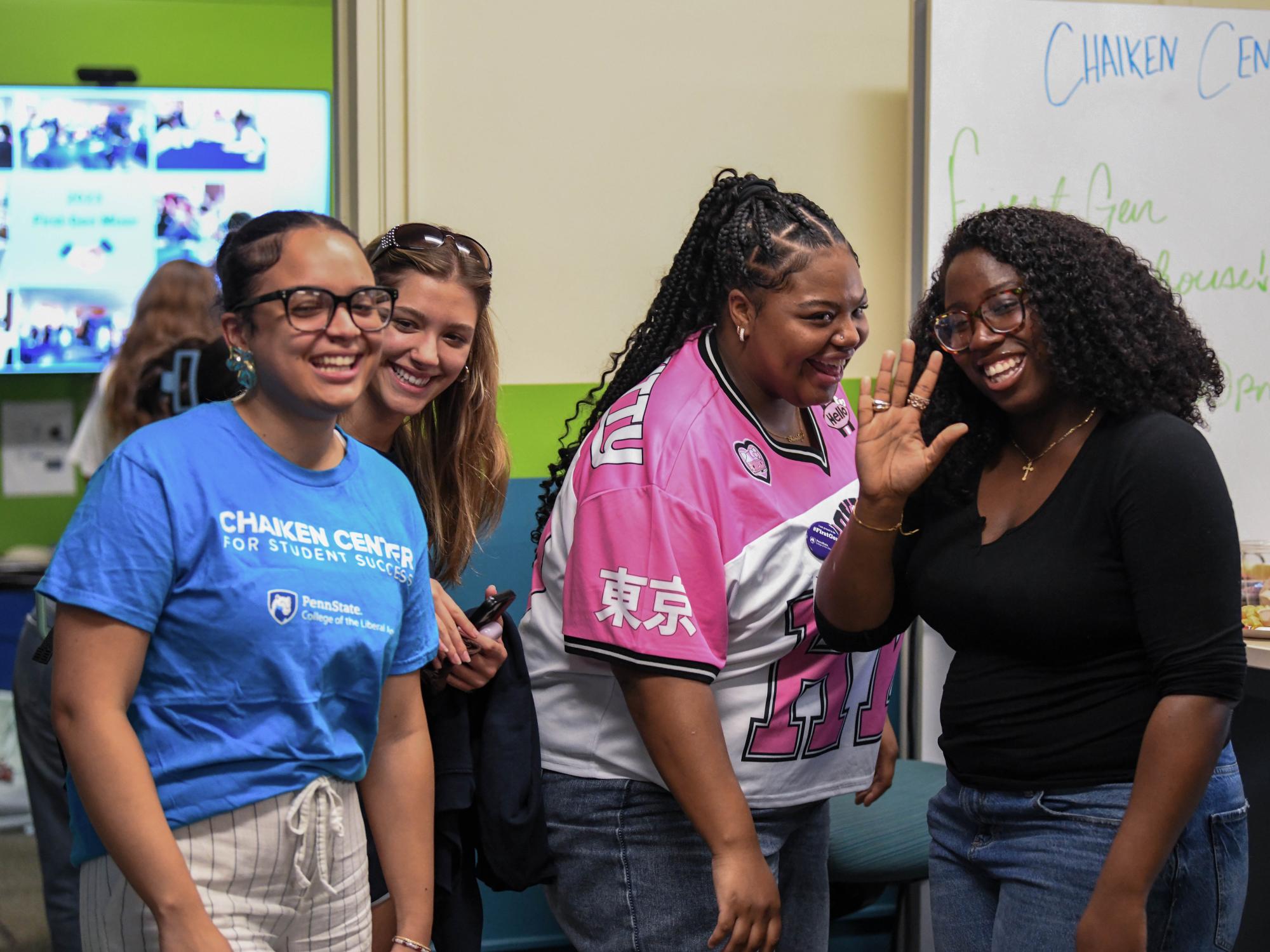 Alexa Sanchez (left) smiles with three other students at the First Gen Open House in September 2025.