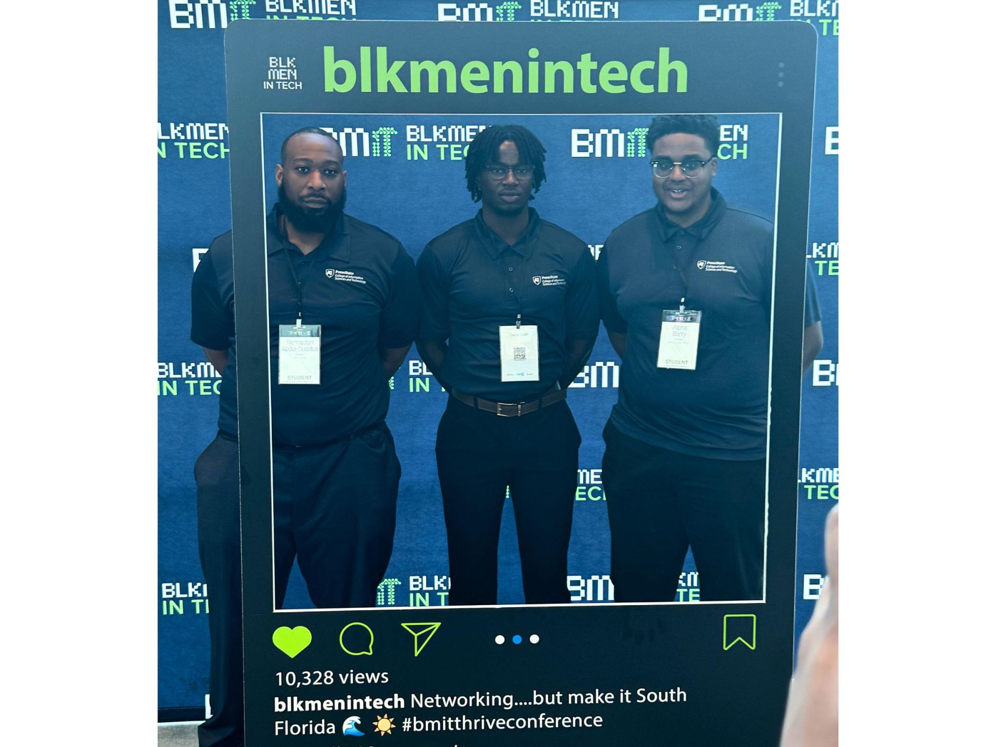 three people pose with Instagram photo prop