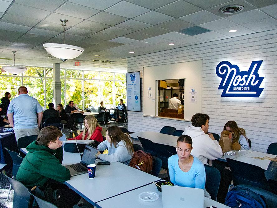 Students and other diners outside Nosh Kosher Deli