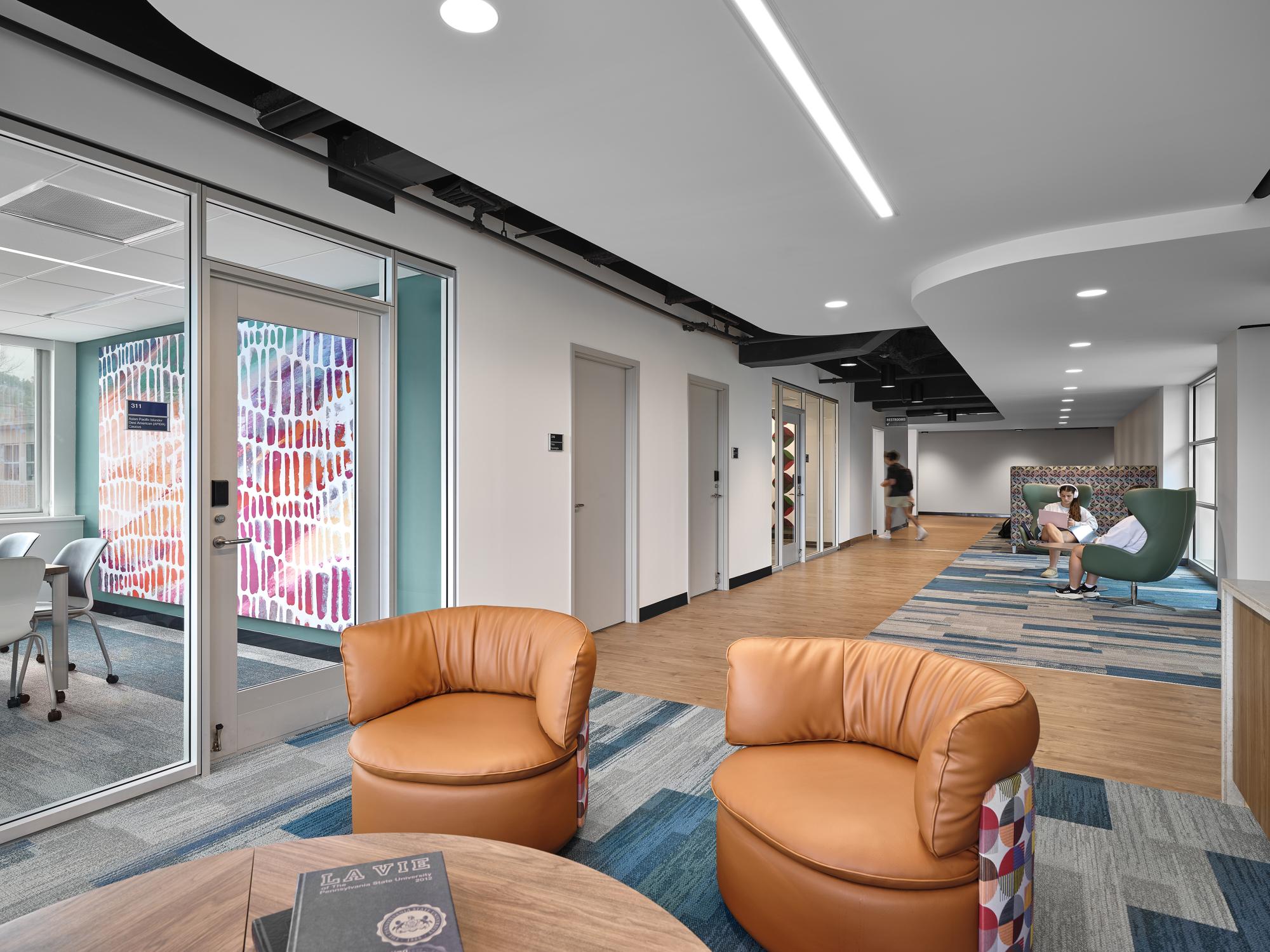 Additional lounge and study space illustrating the APIDA (Asian Pacific Islander Desi American) and MENA (Middle Eastern and North African) Caucus offices on the left.