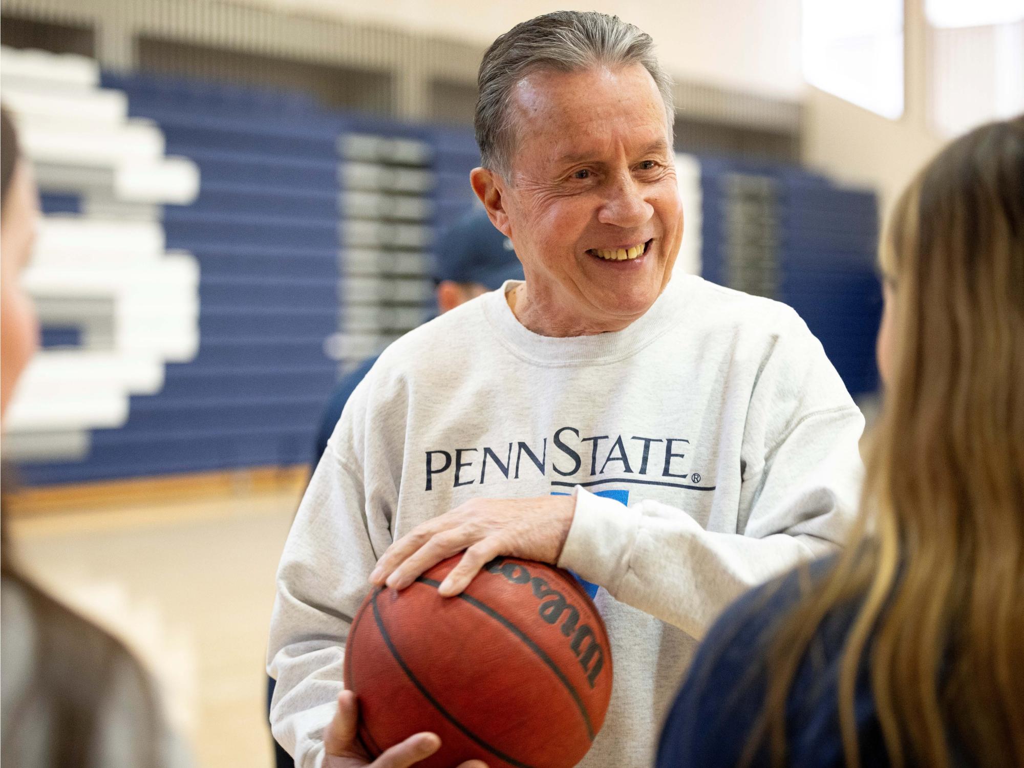 man in Penn State sweatshirt