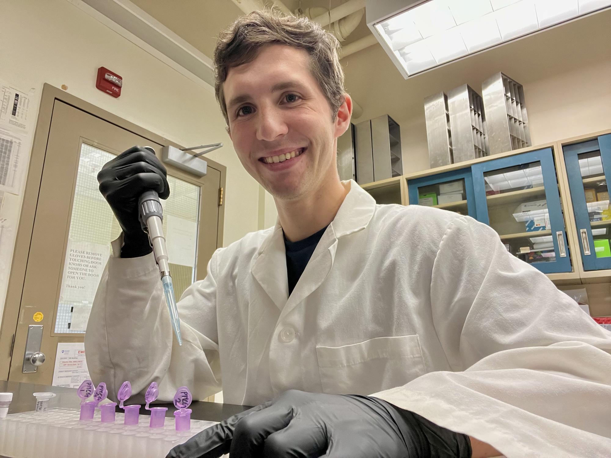 a student in a lab coat