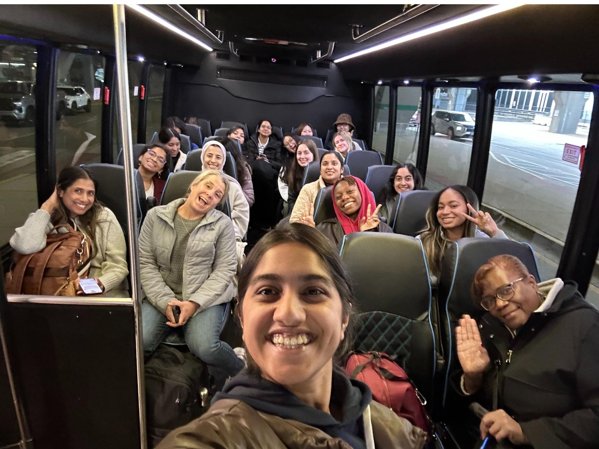 group of happy people on a bus