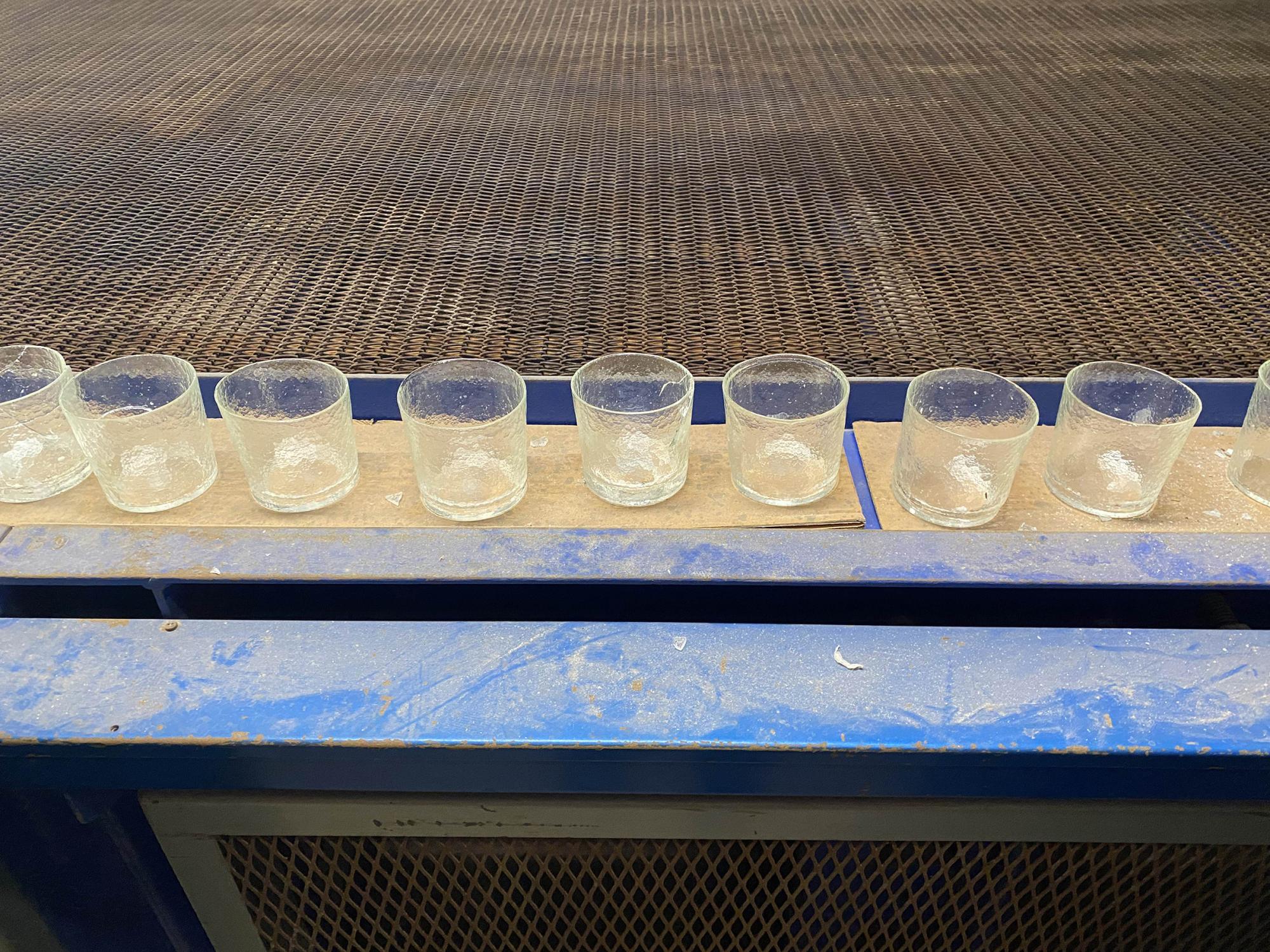 Glass cups in a row
