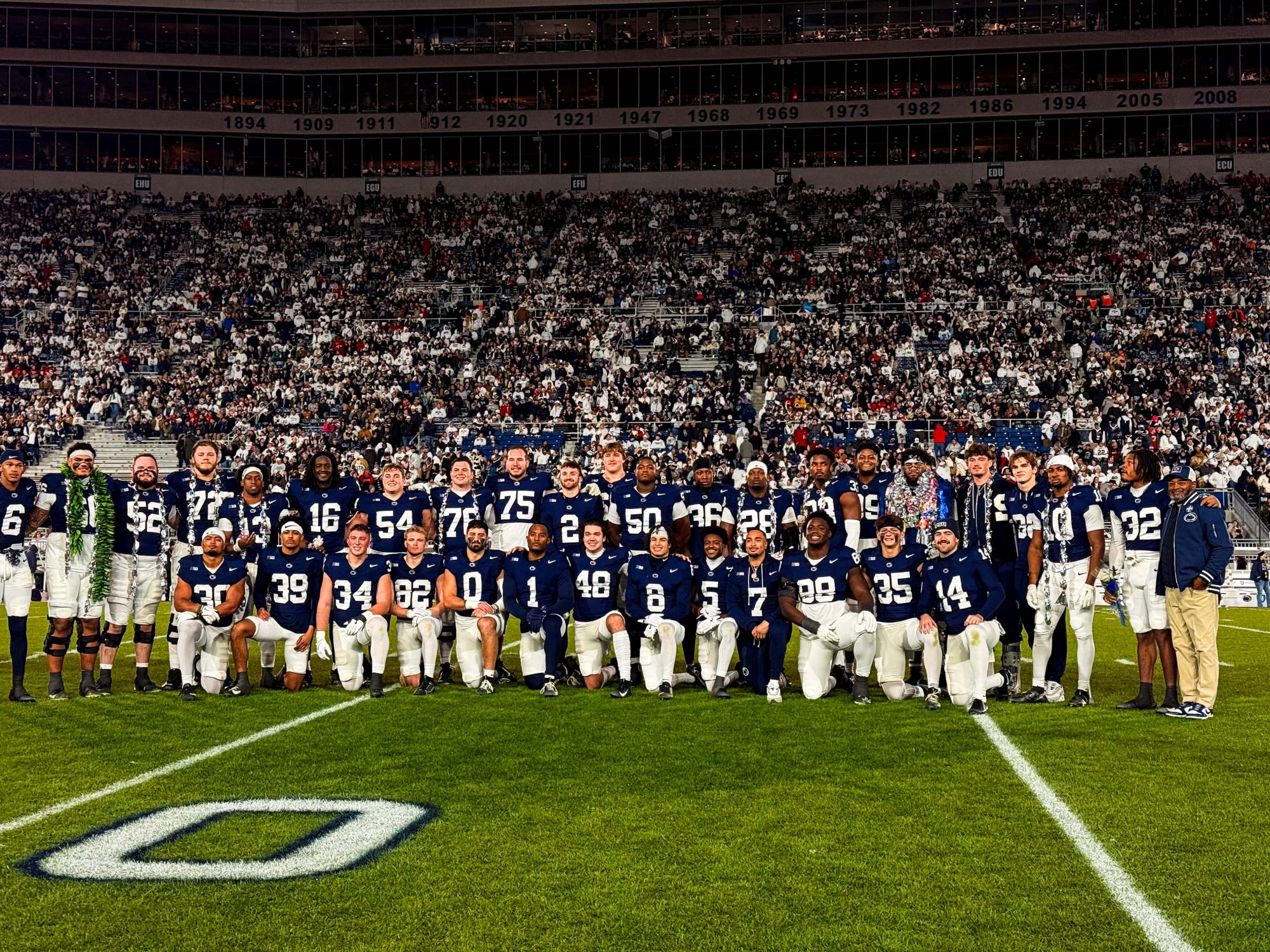Football players standing together in a group photo