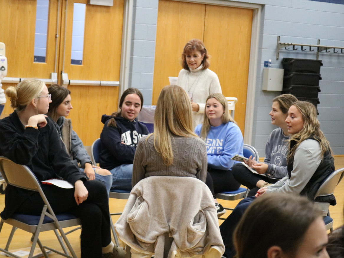 Students sit in a group