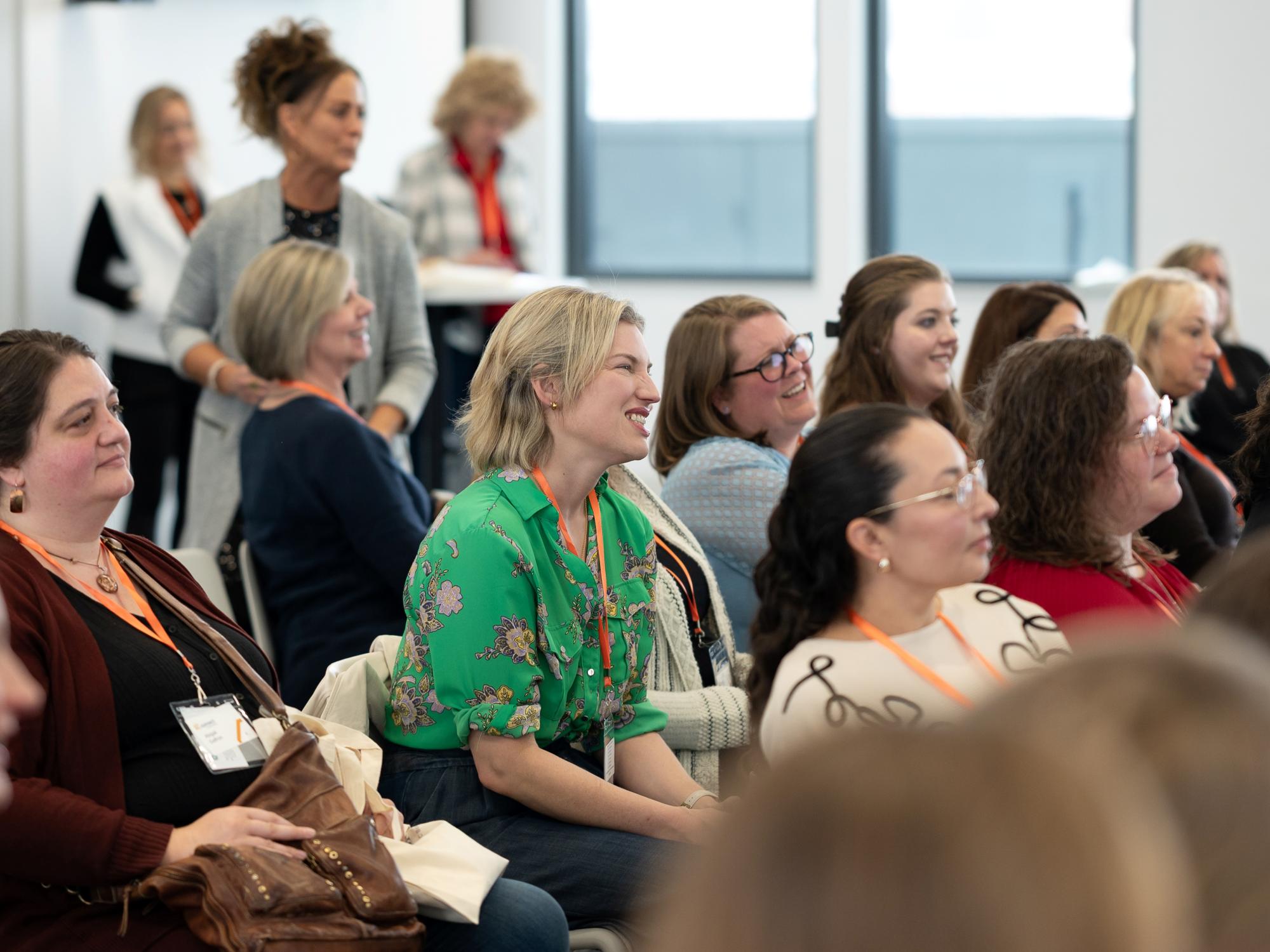 An engaged several rows of audience members