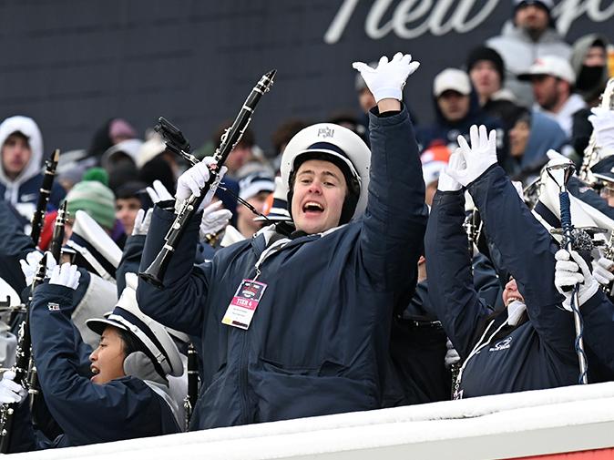 A band member cheers