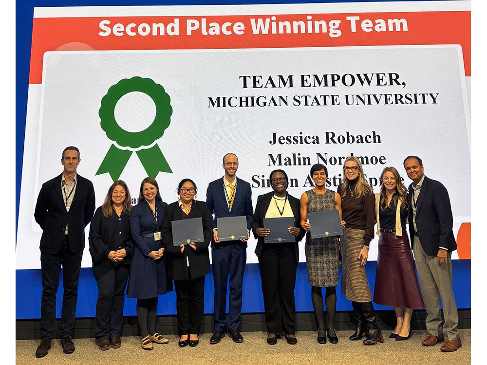 Michigan State students hold certificates they received for finishing second at 2025 HR Case Competition