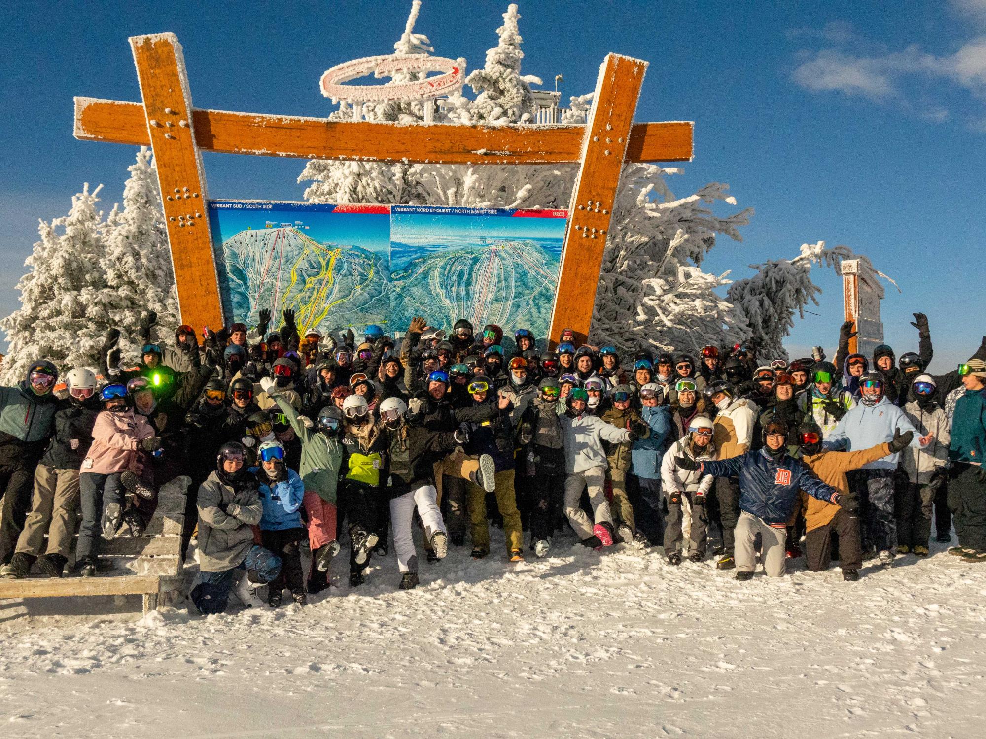 Kayla Lynch with a large group of Penn State students on the slopes. 
