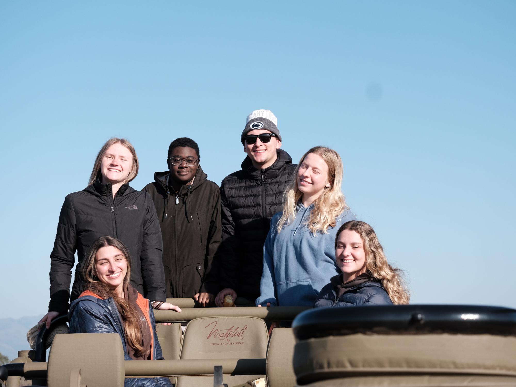 Global Health Minor students in a safari vehicle in South Africa