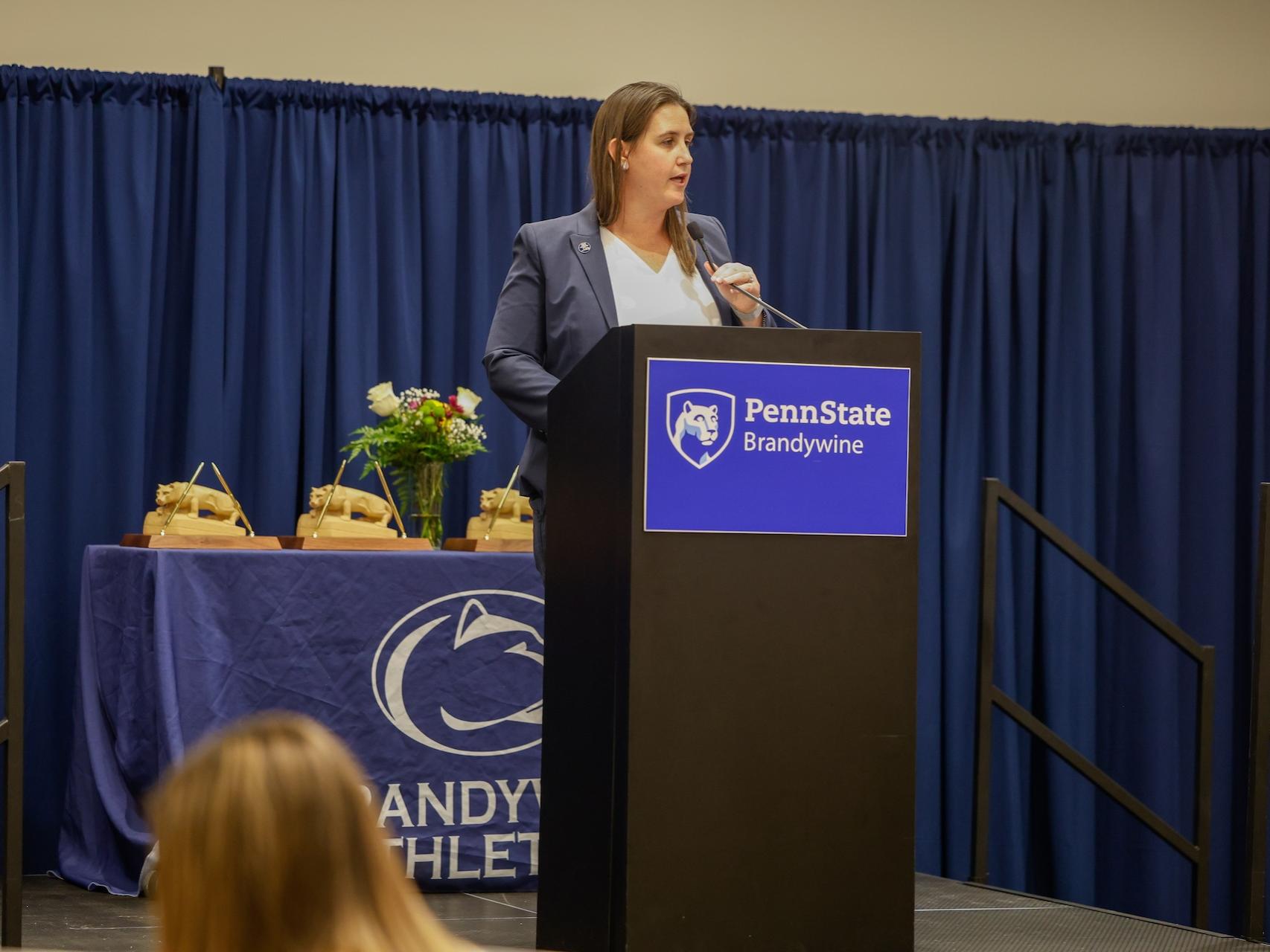bobbi caprice at podium with Penn State Brandywine