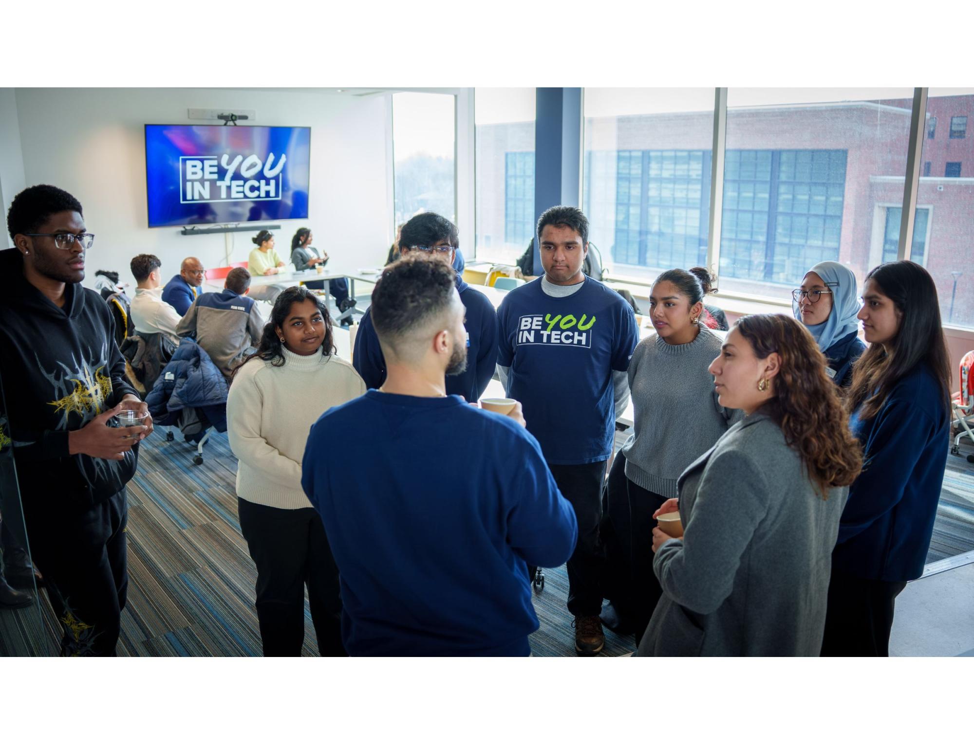 small group of people mingling at a gathering