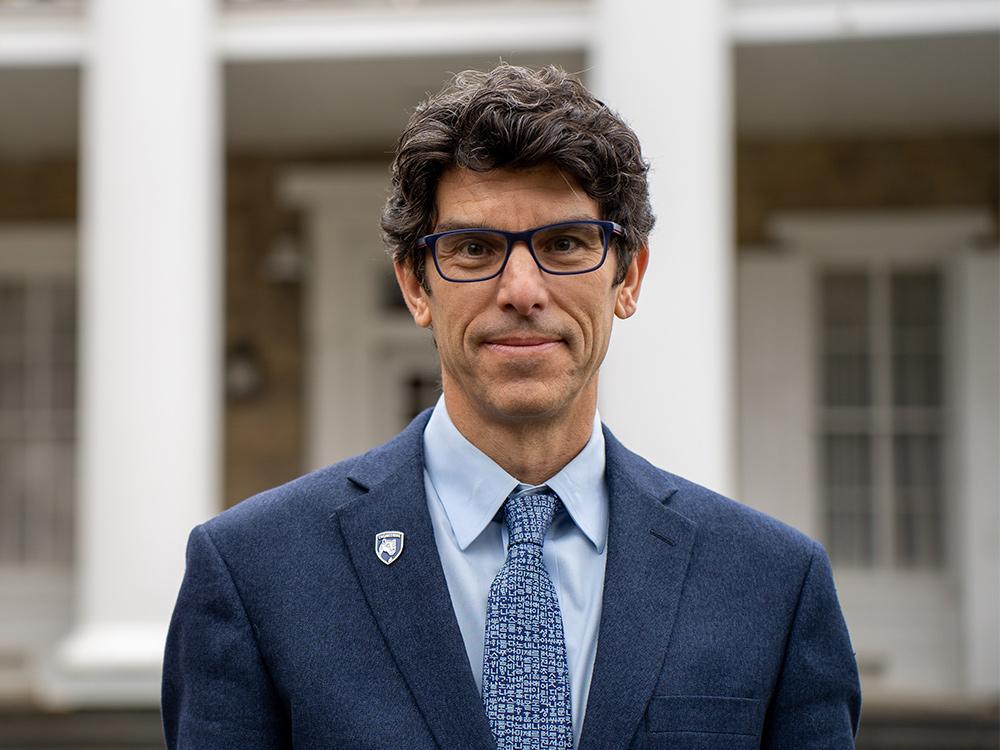 a portrait photo of Bill Burgos