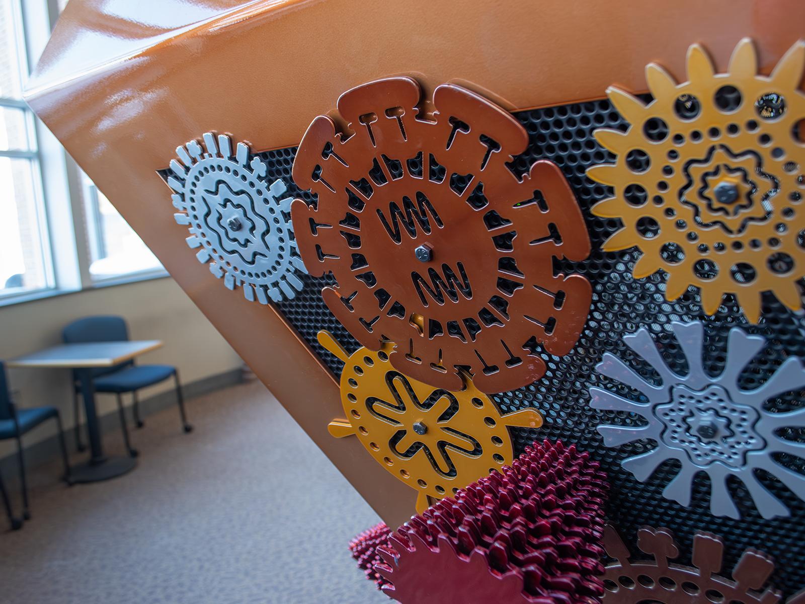 Closeup portion of BioMachine, an aluminum sculpture that aims to bring together science and art