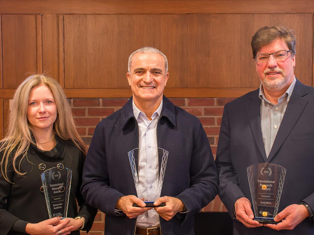 People holding awards
