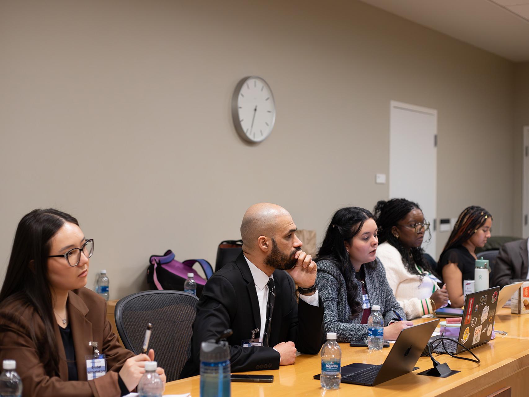 Students in the Finnish delegation meeting with other delegations.