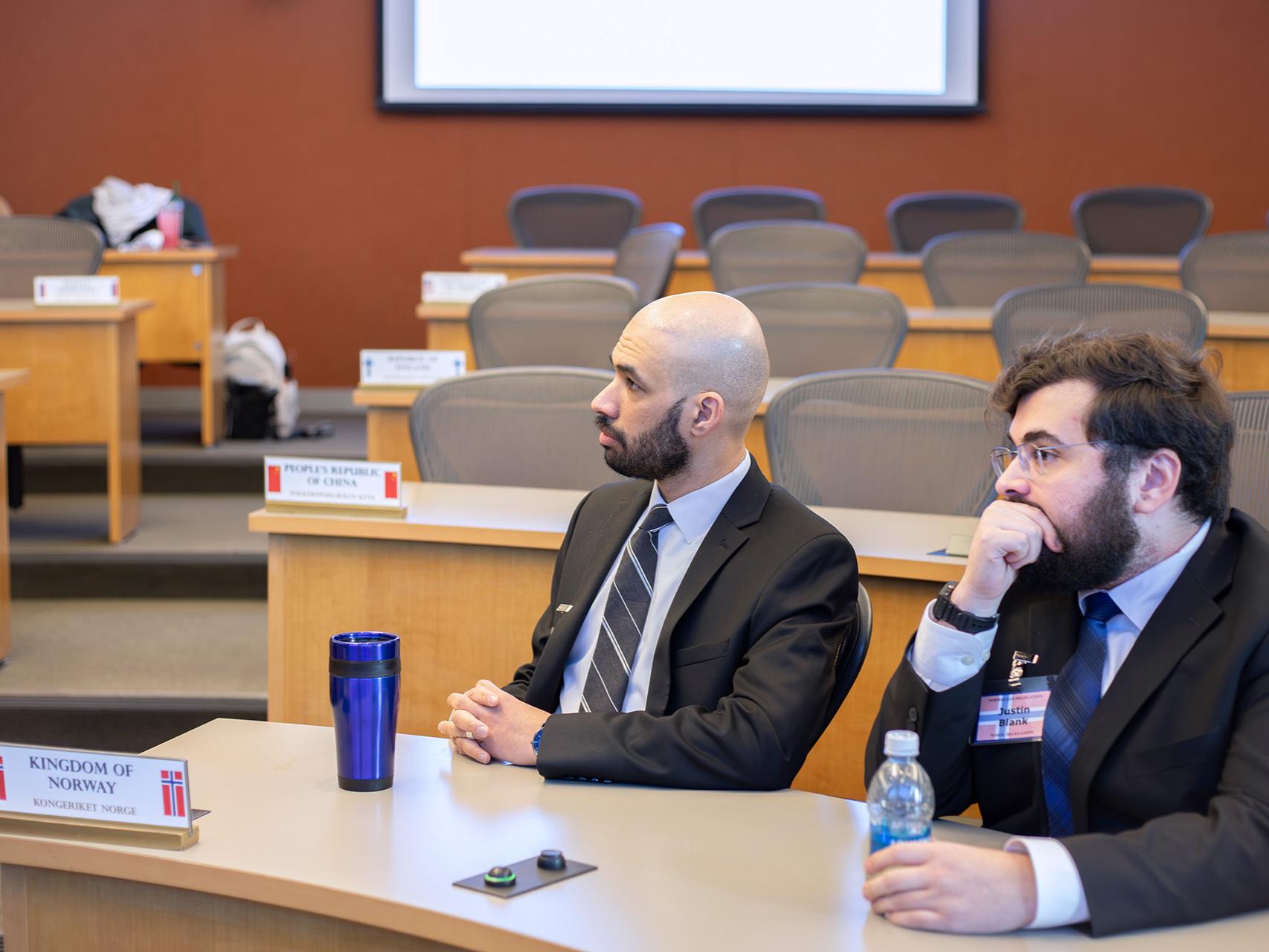 A member of team Finland (left) and Norway (right) at the simulation.