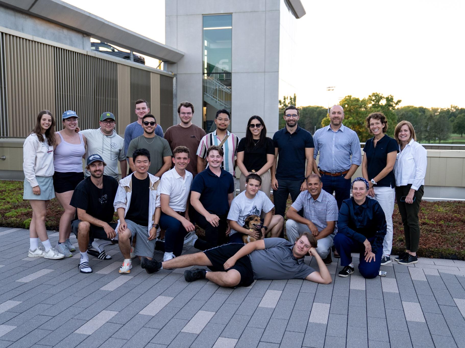 A large group of students posing outside