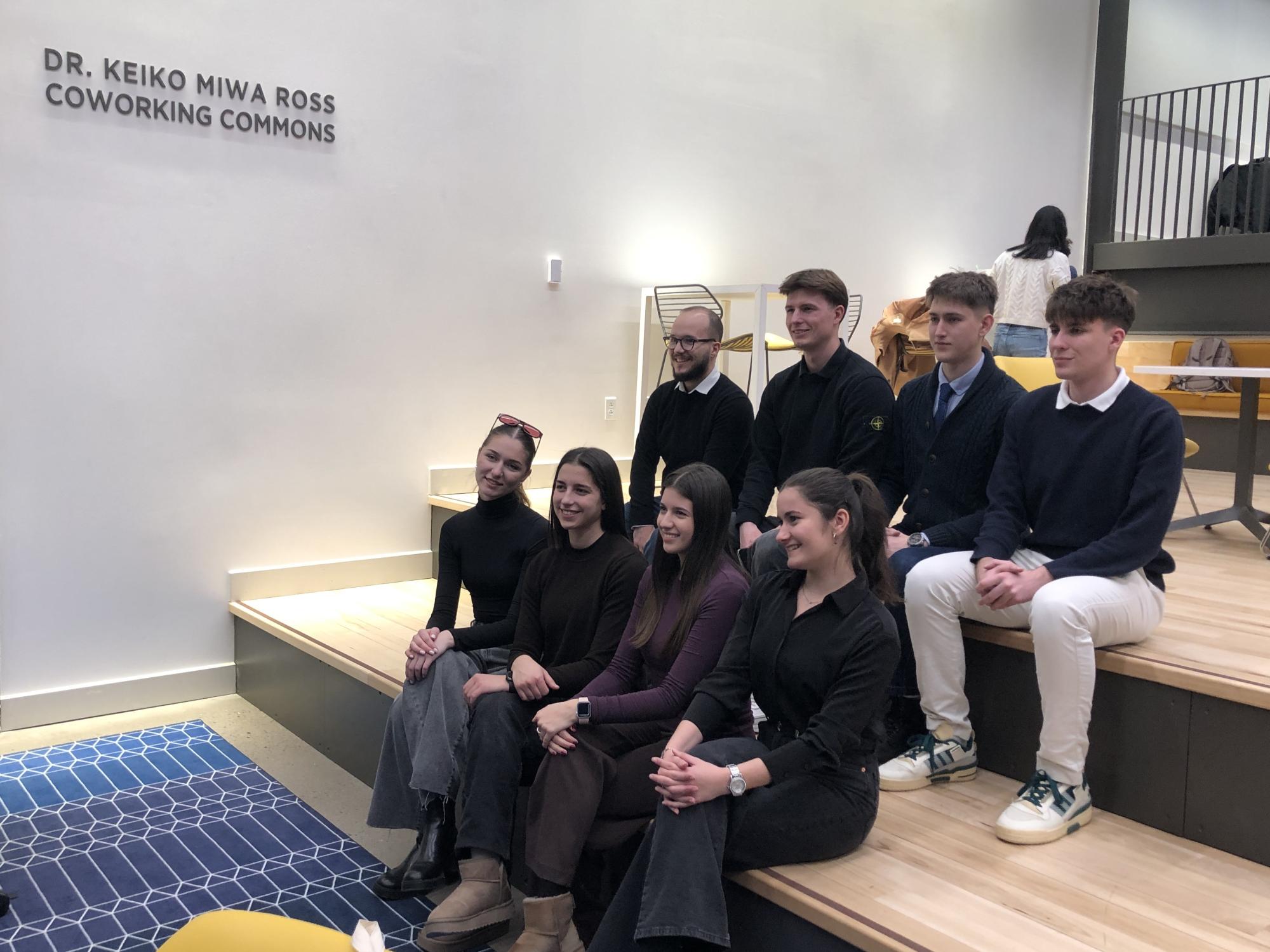 A group of students sit in the Dr. Keiko Miwa Ross Coworking Commons