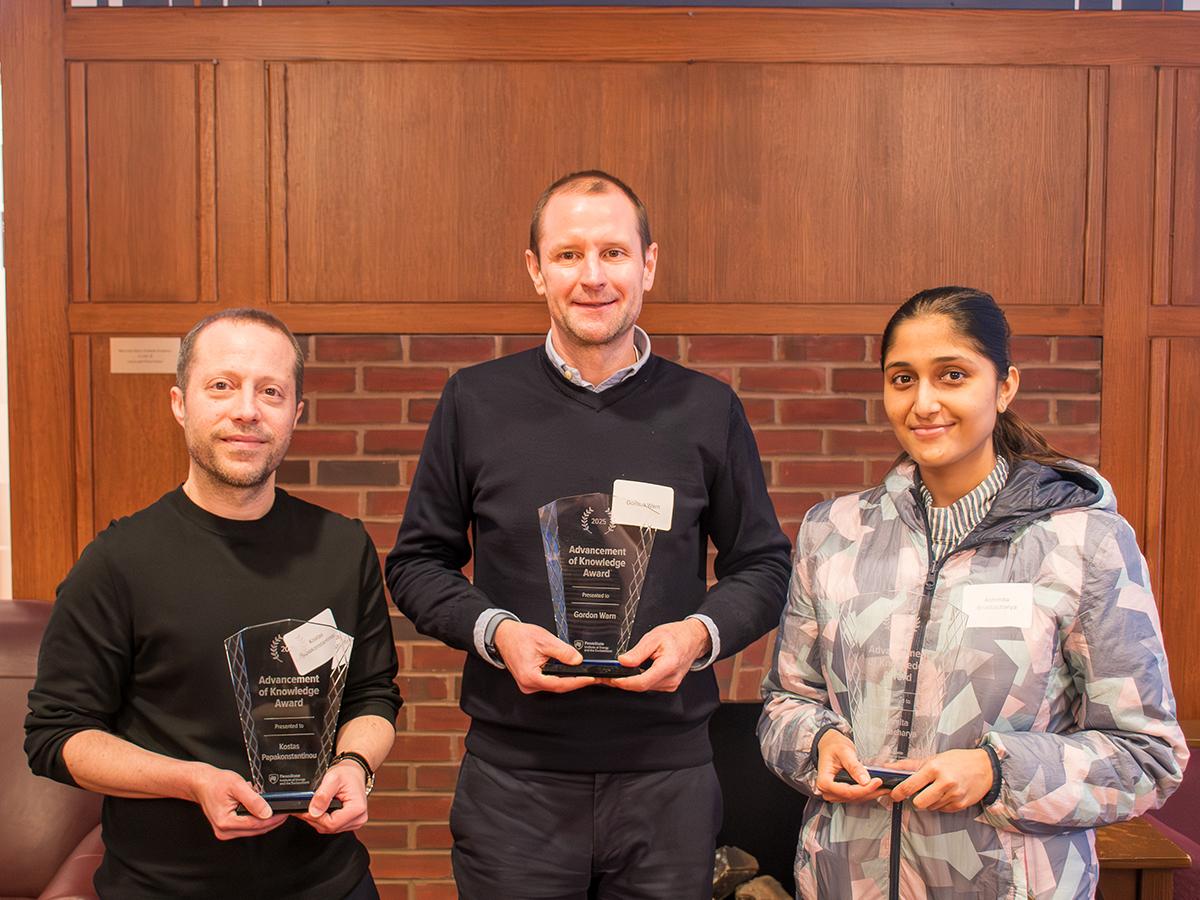 People holding awards