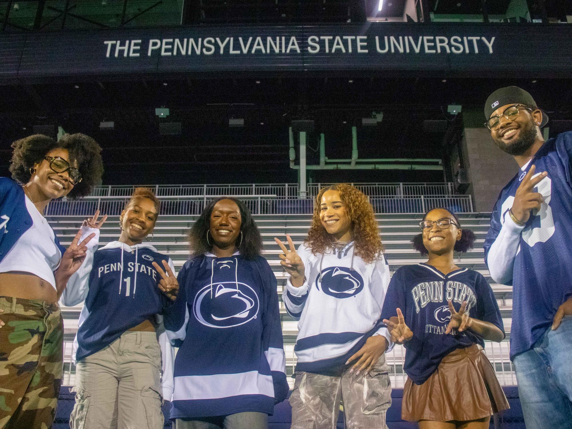 Alivia Peterson (third from right) stands with five other members of the Minorities in Sports at Penn State 2025–2026  executive board taken in the field hockey complex.