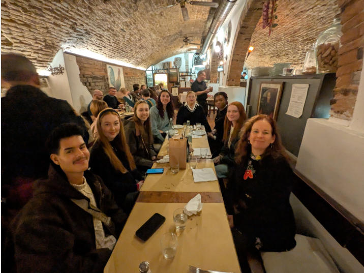 Students around a dinner table