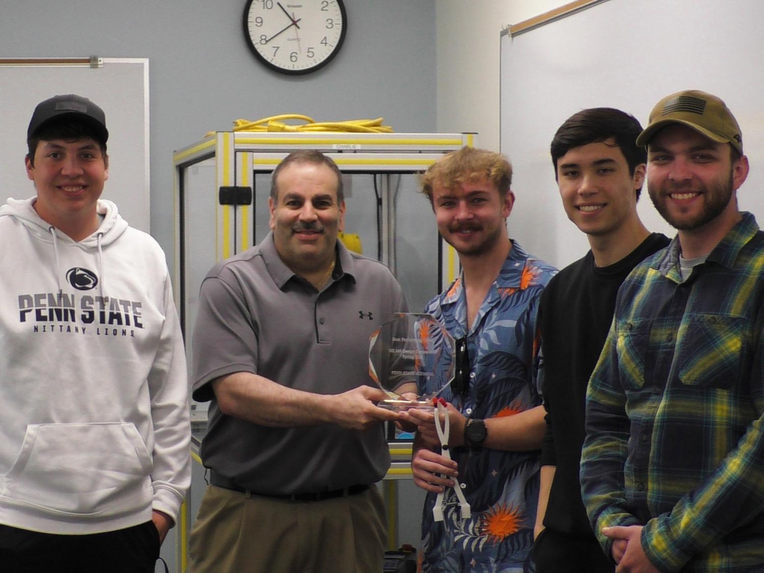 Grant Risha and students