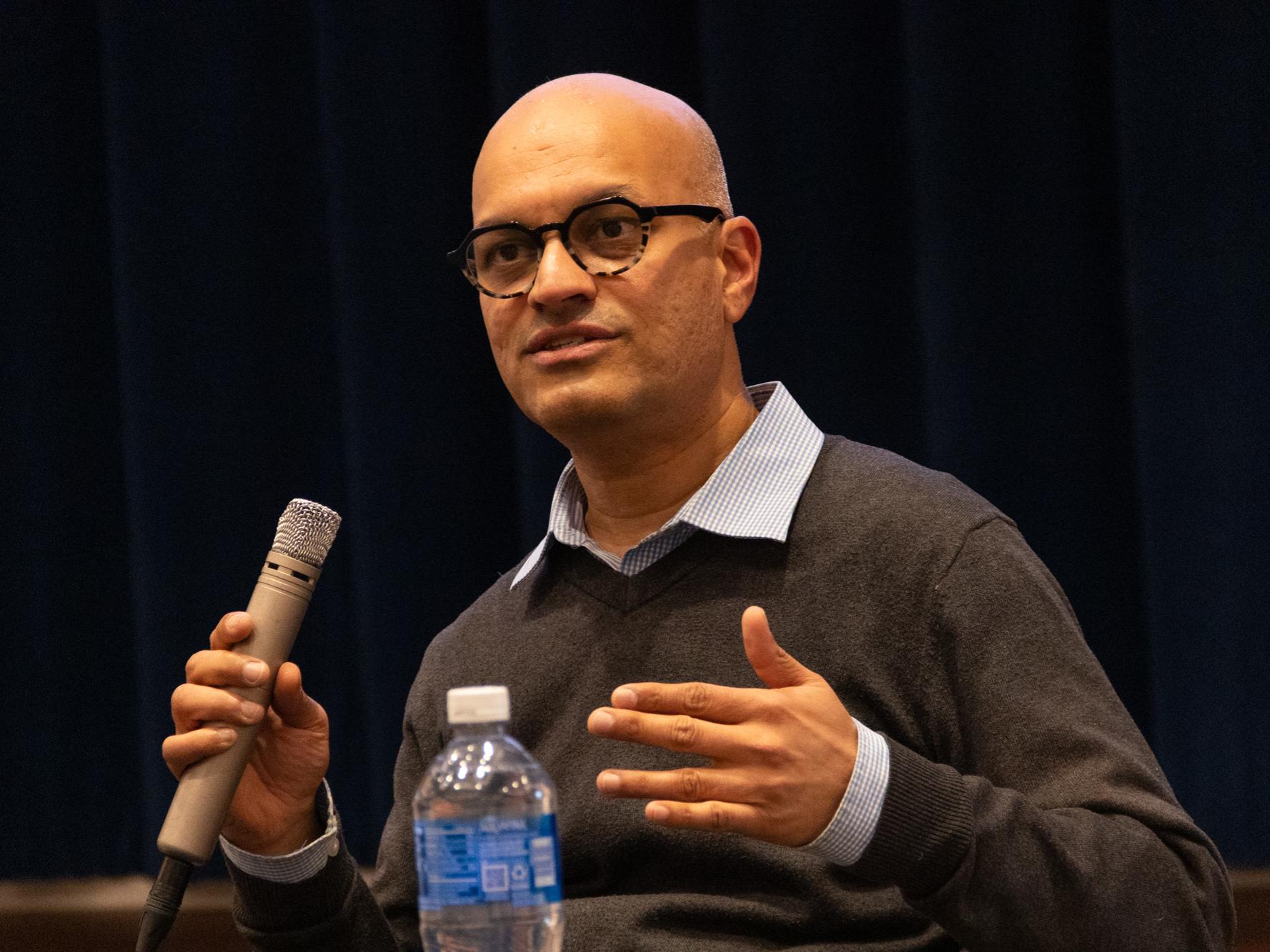Santhosh Girirajan speaking to residents at the Village at Penn State during Brain Awareness Week. 