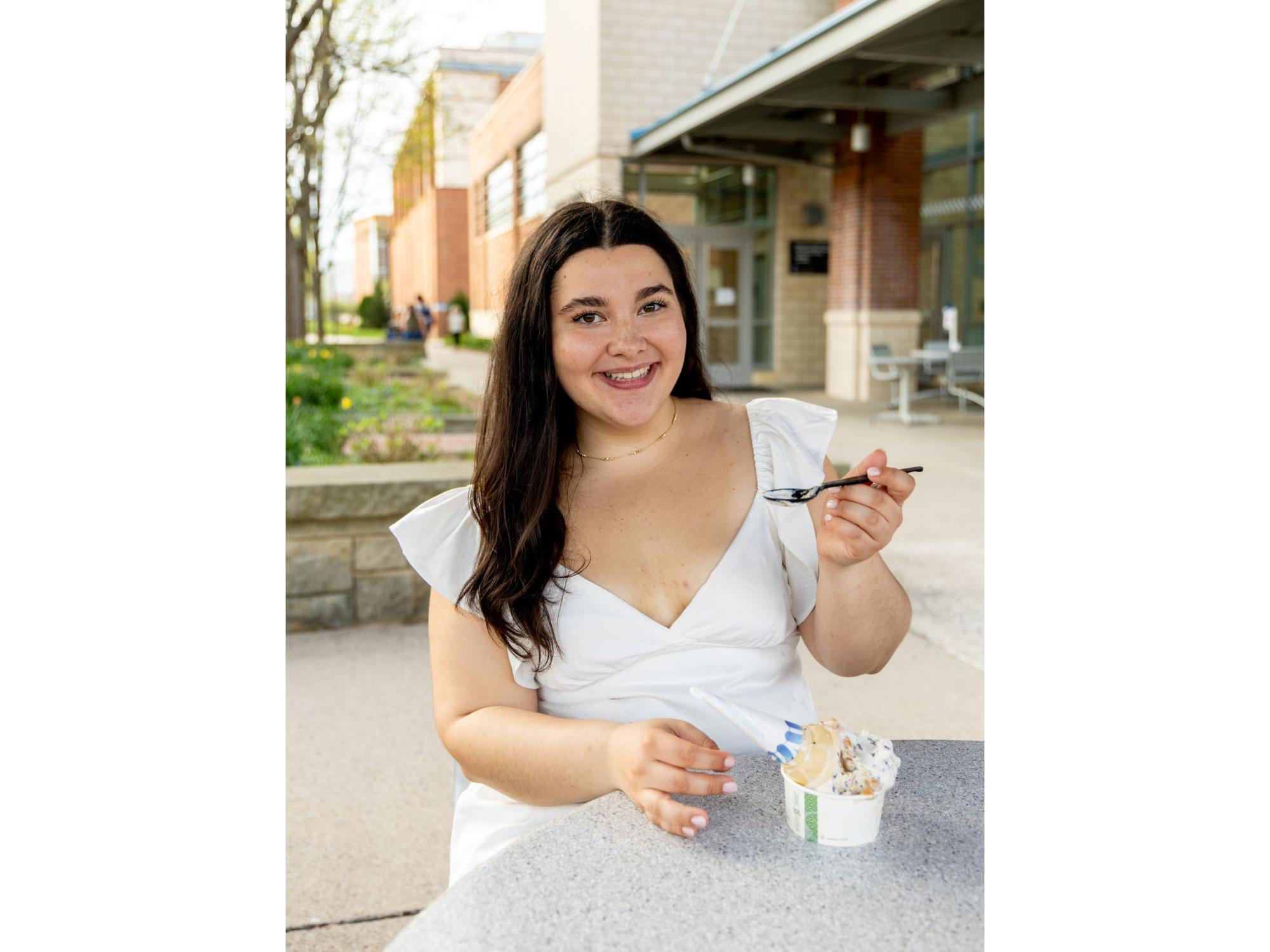 Katie Rupert eating Penn State Creamery ice cream.
