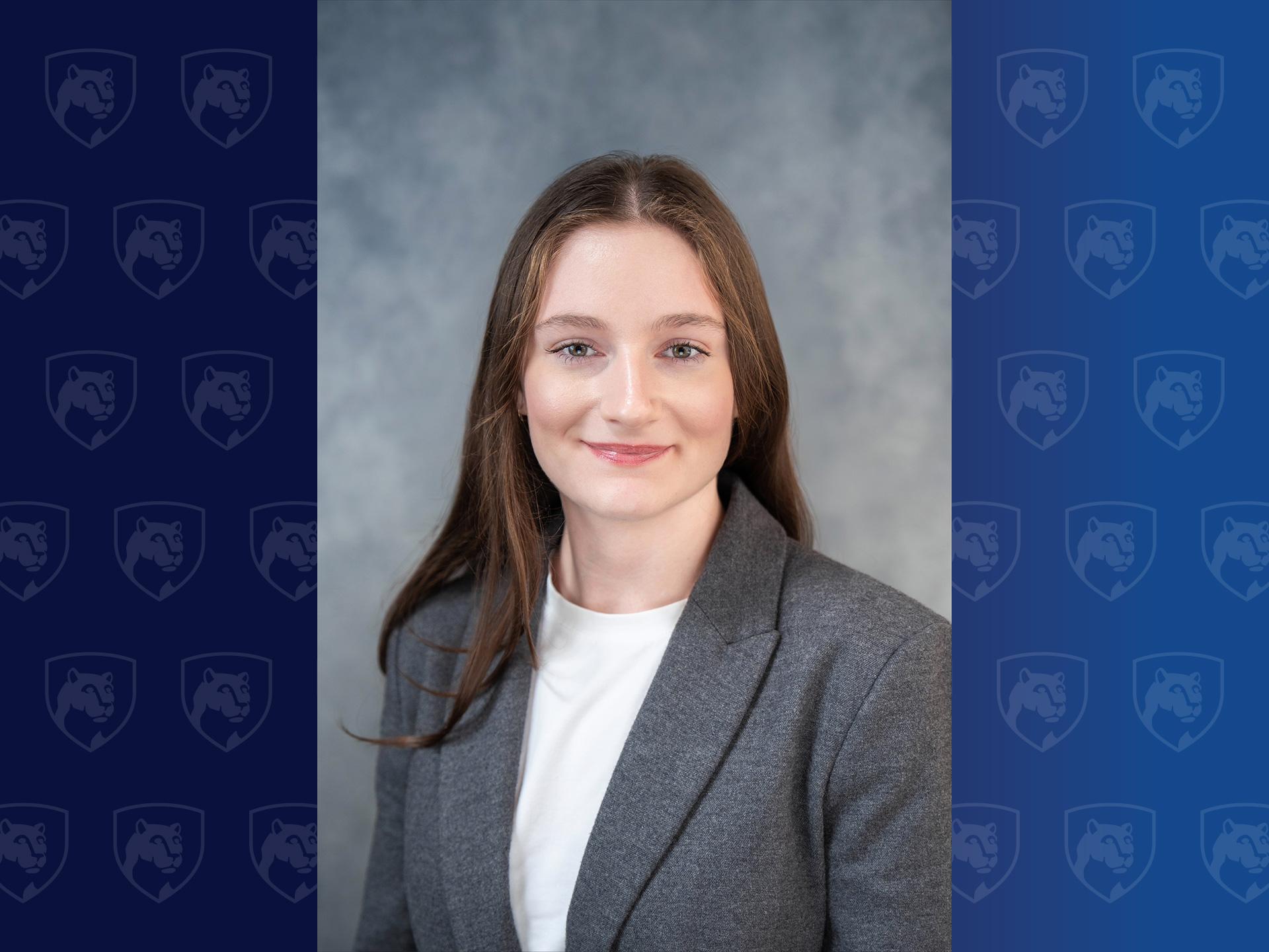 headshot of a woman in a suit